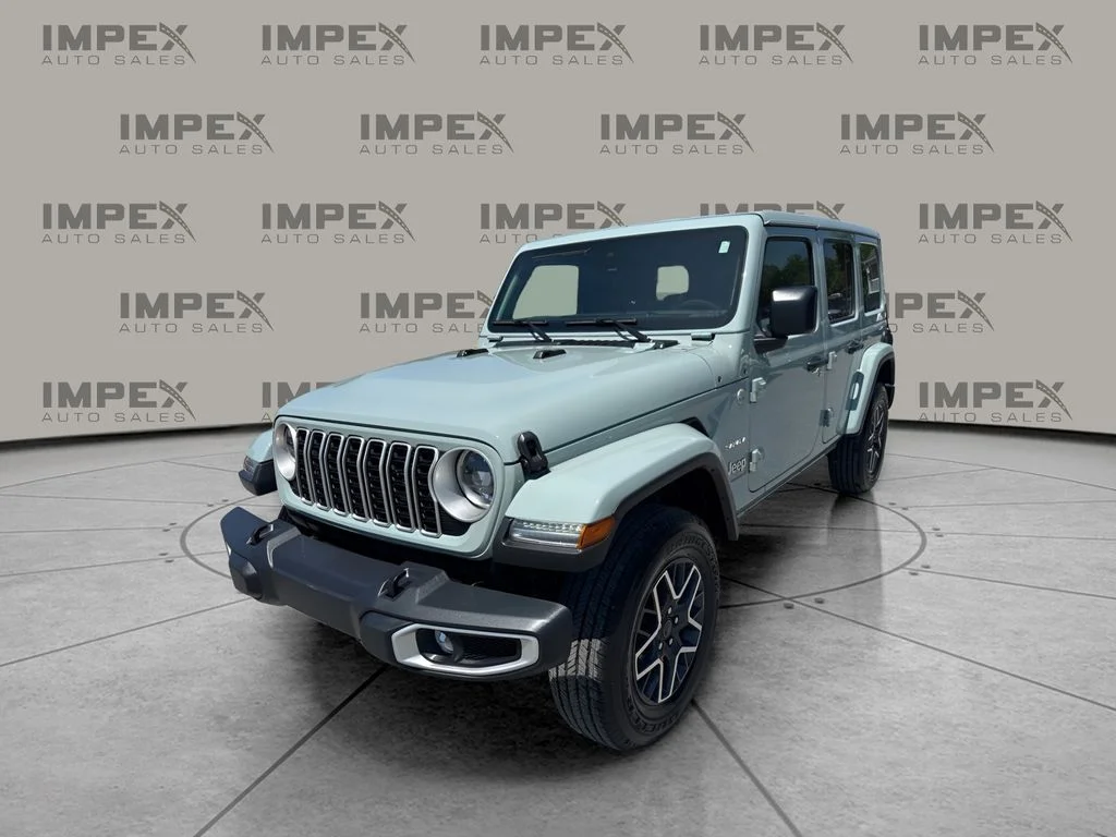 Used 2024 Gray Jeep Sahara image 1