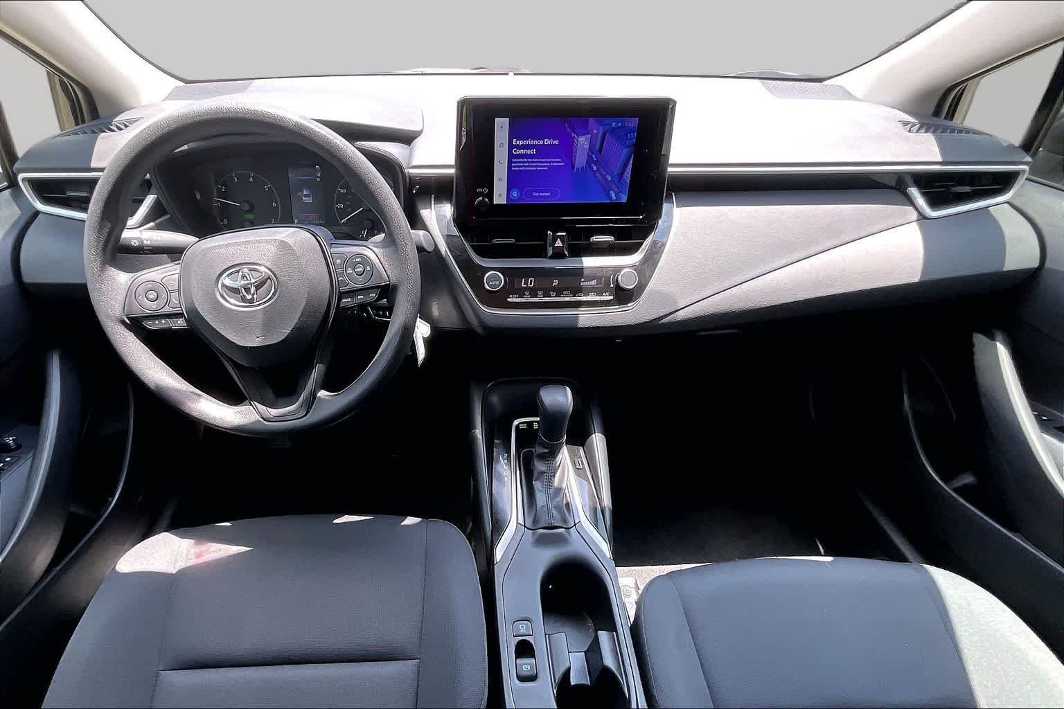 Used 2025 Midnight Black Metallic Toyota Hybrid LE image 14