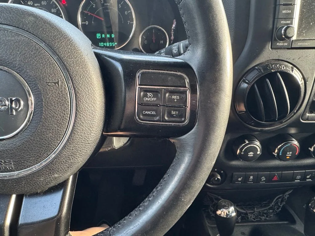 Used 2017 Black Jeep Unlimited Sahara image 16