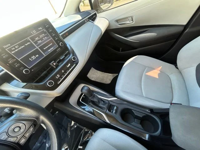 Used 2021 Super White Toyota LE image 26