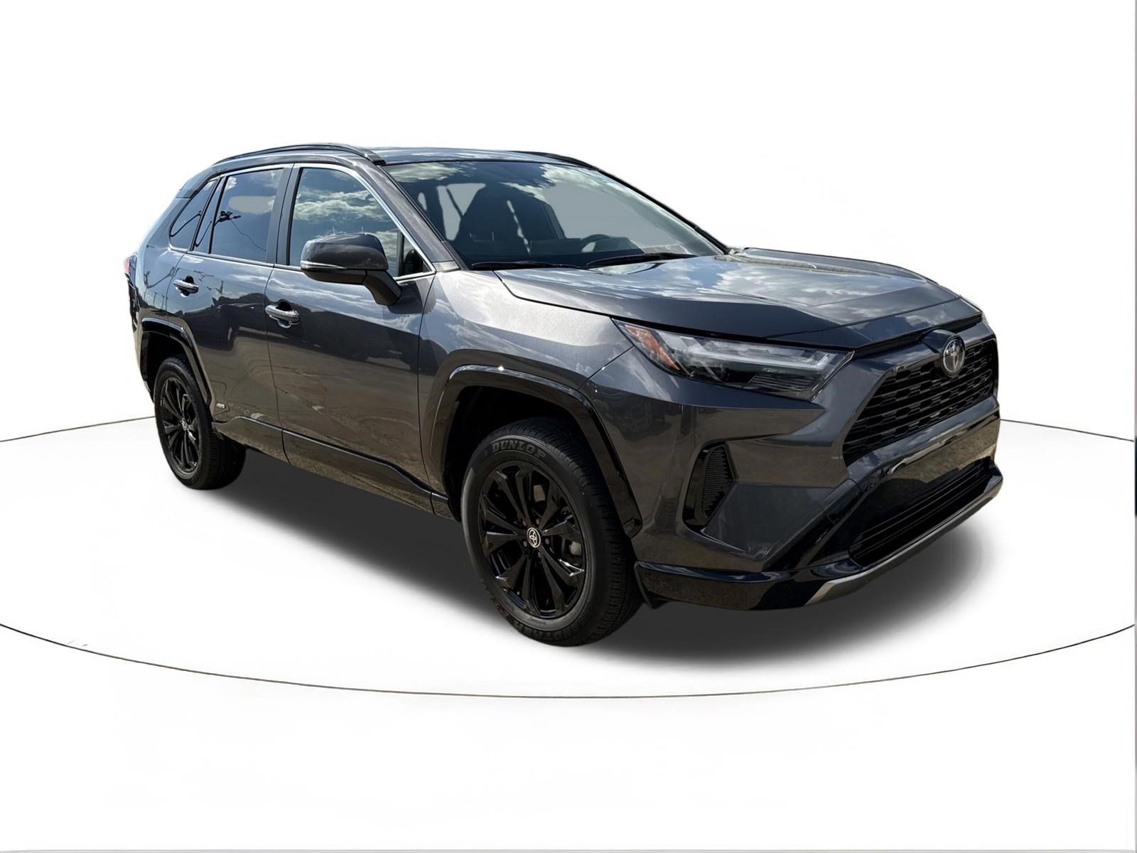 Used 2024 Magnetic Gray Metallic Toyota Hybrid SE image 1