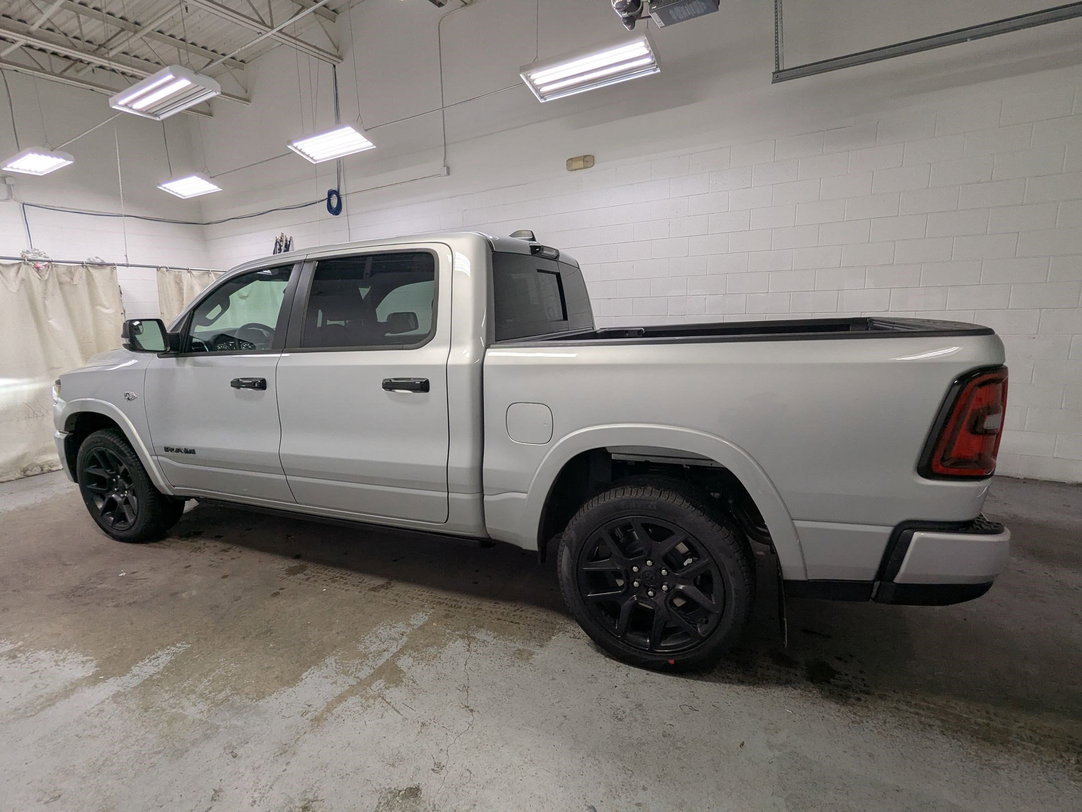 New 2026 Silver Zynith Exterior Paint RAM Laramie image 8