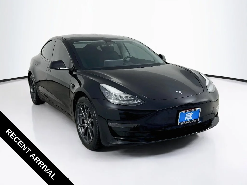 Used 2019 Solid Black Tesla Long Range image 1