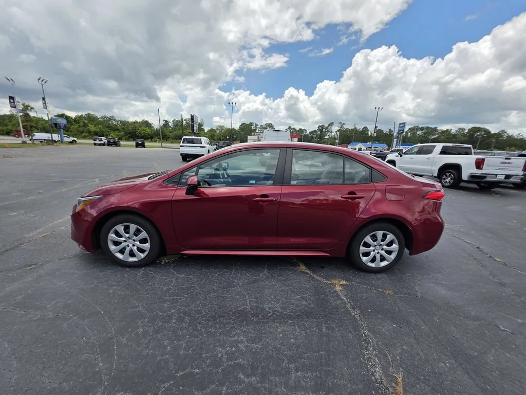 Used 2024 Red Med Toyota LE image 2