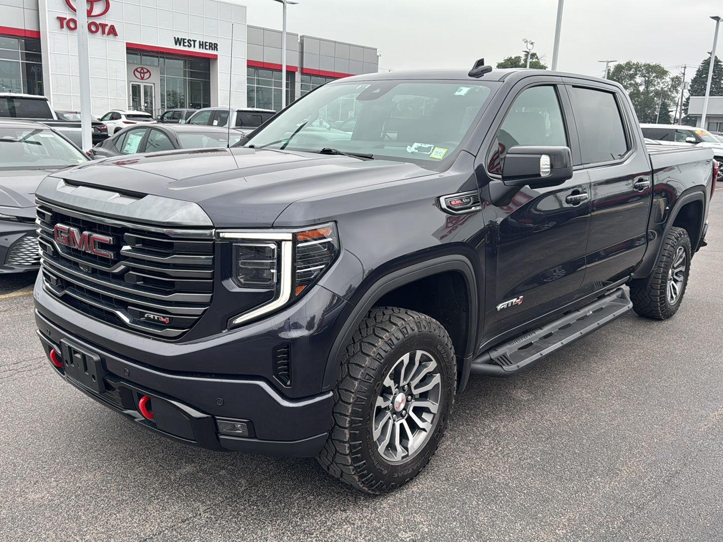 Used 2023 Titanium Rush Metallic GMC AT4 image 3