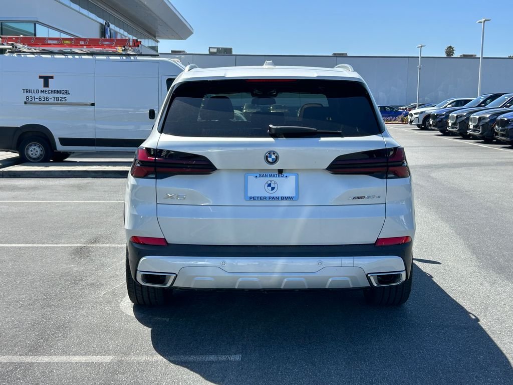 New 2026 Mineral White Metallic BMW xDrive50e image 4