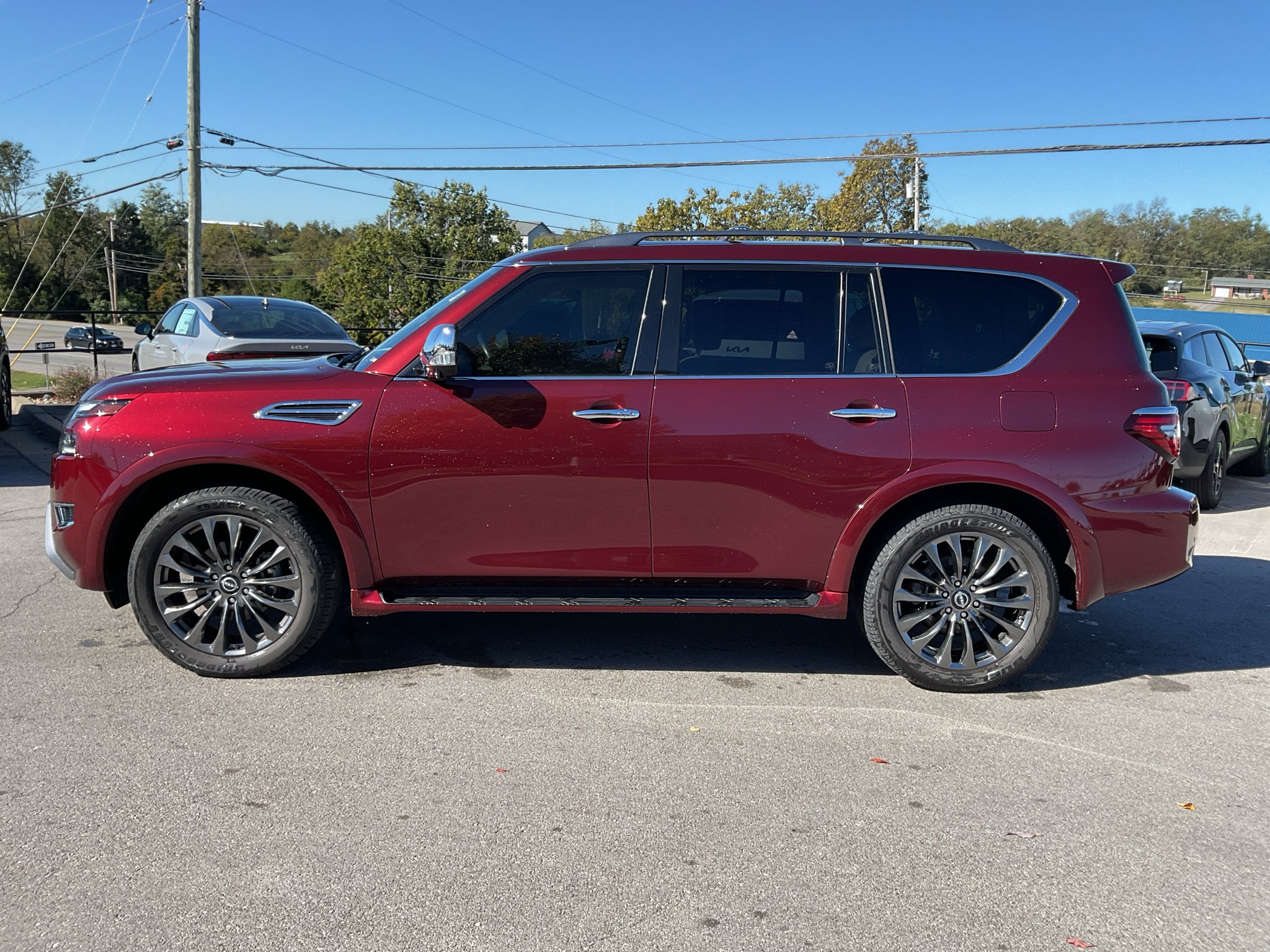 Used 2023 Coulis Red Pearl Nissan Platinum image 7