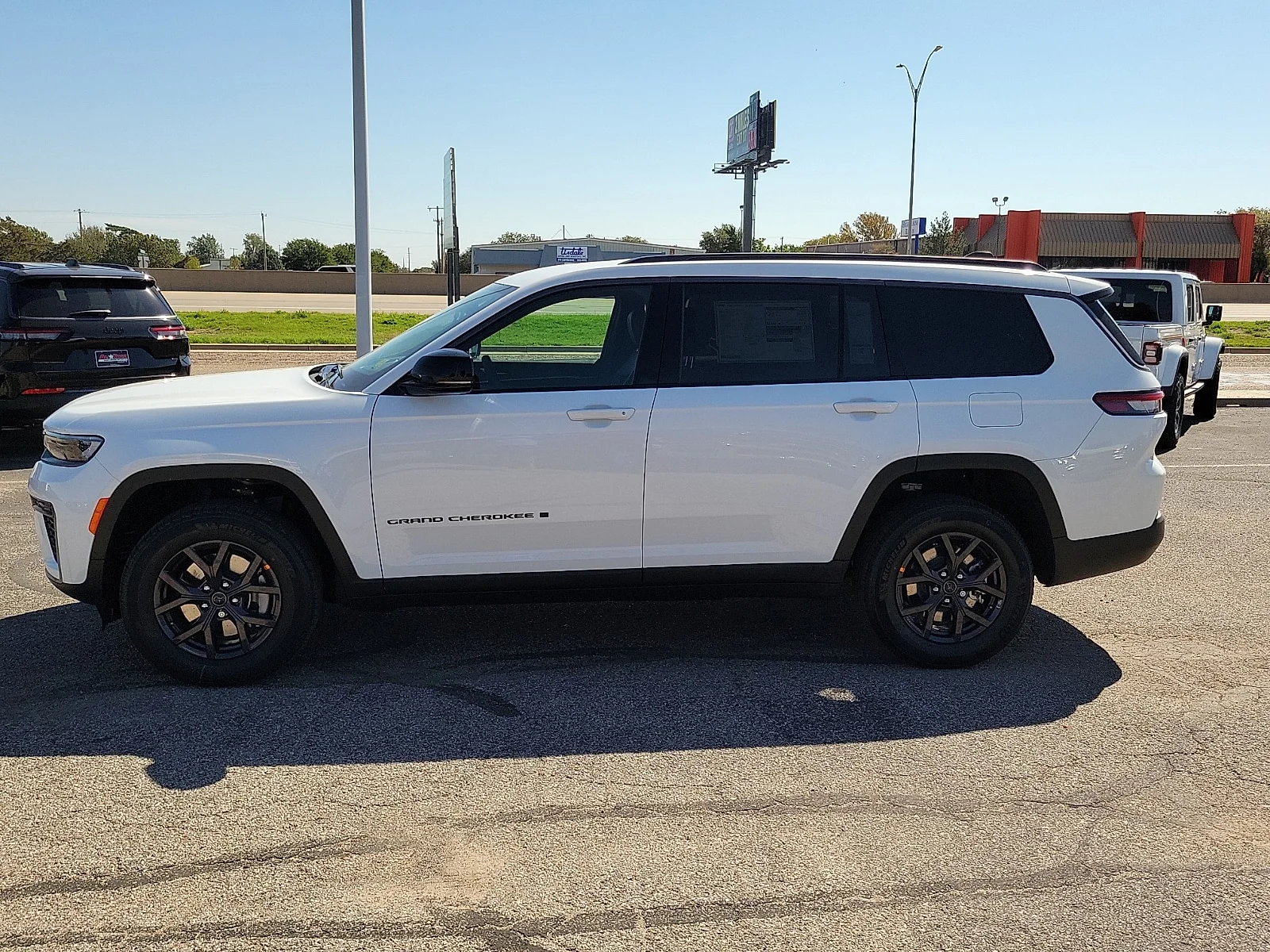 New 2027 Bright White Jeep L LAREDO ALTITUDE 4X2 image 2