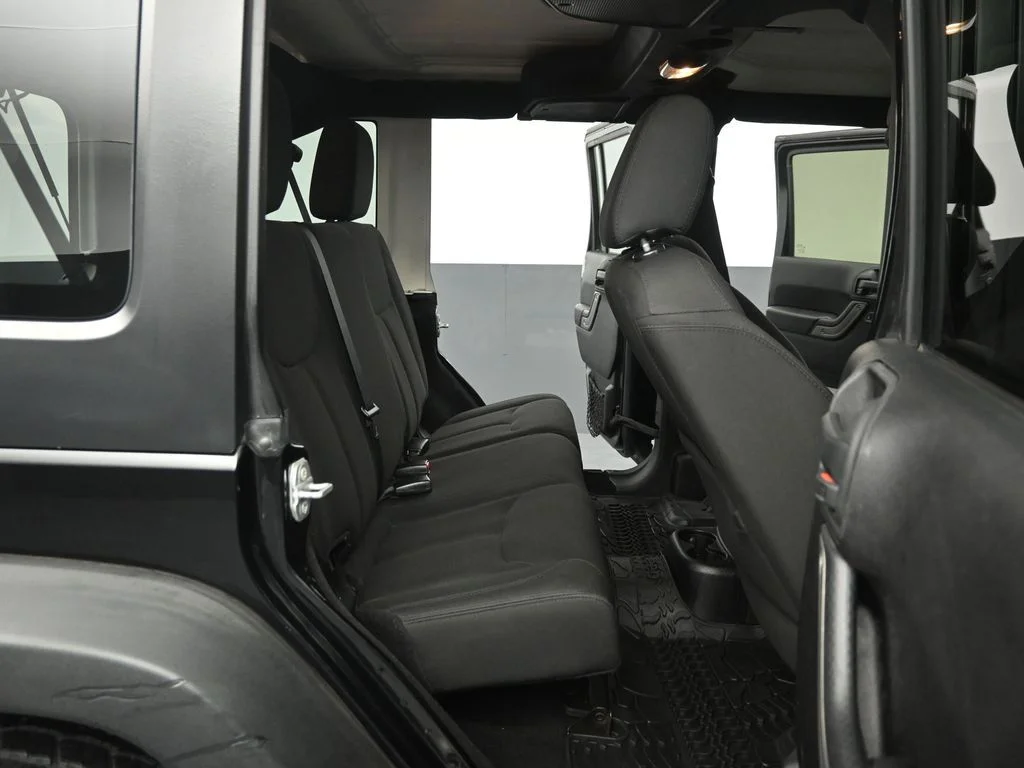 Used 2015 Black Jeep Unlimited Sport image 22