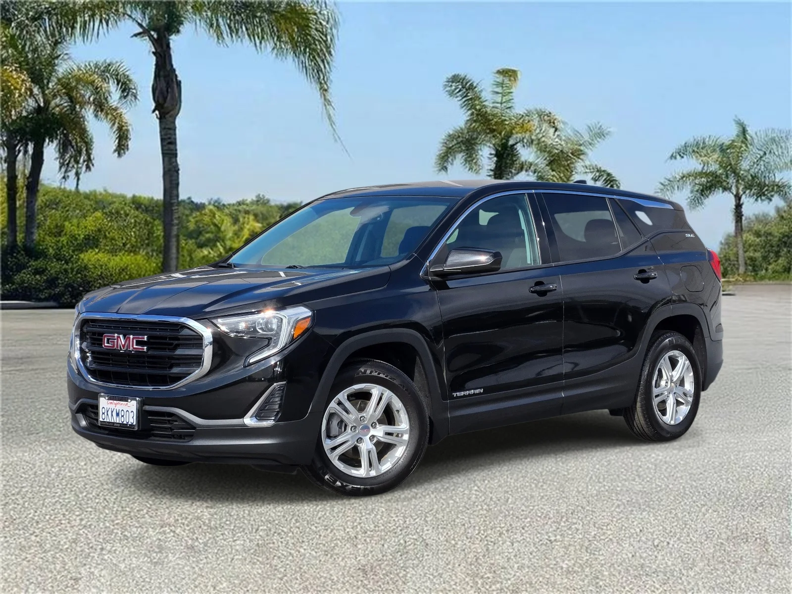 Used 2019 Ebony Twilight Metallic GMC FWD 4dr SLE image 1