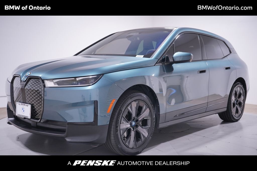 Certified Used 2024 Blue BMW xDrive50 image 1