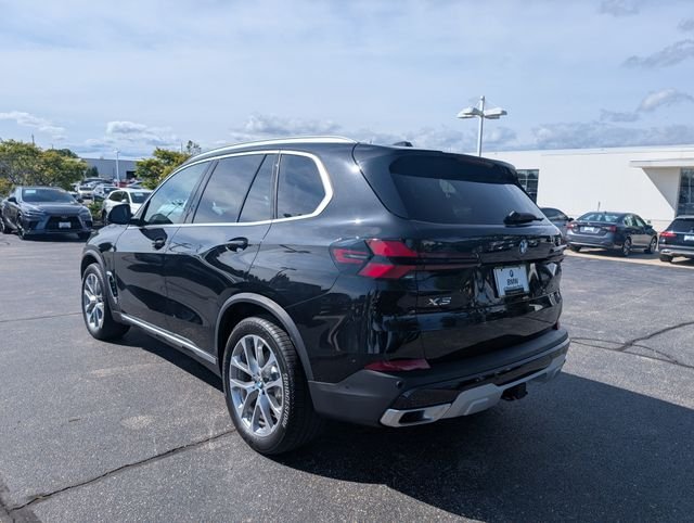 Certified Used 2026 Black Sapphire Metallic BMW xDrive40i image 2