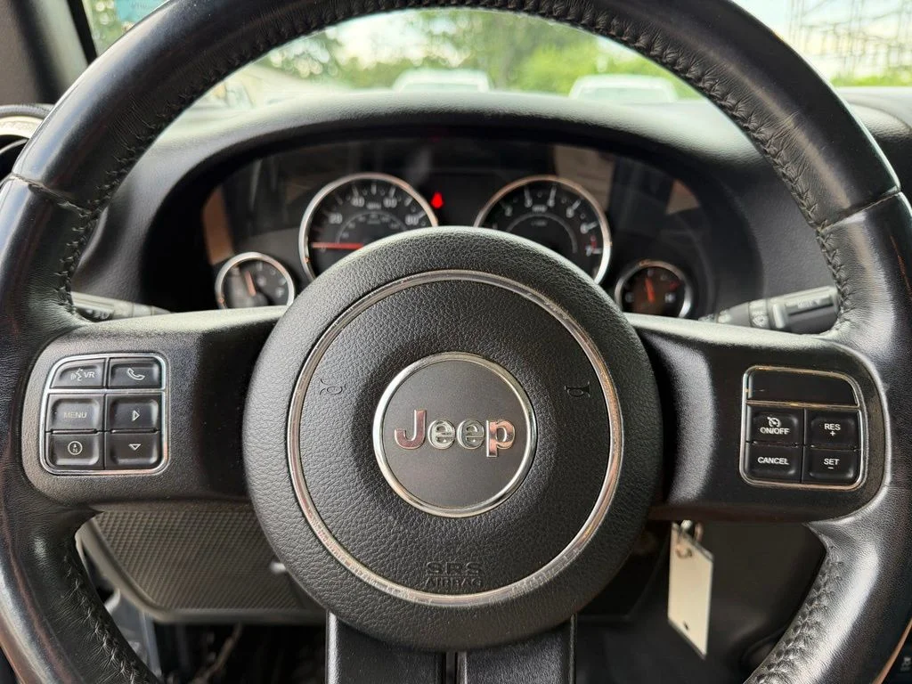 Used 2017 Black Jeep Unlimited Sahara image 32