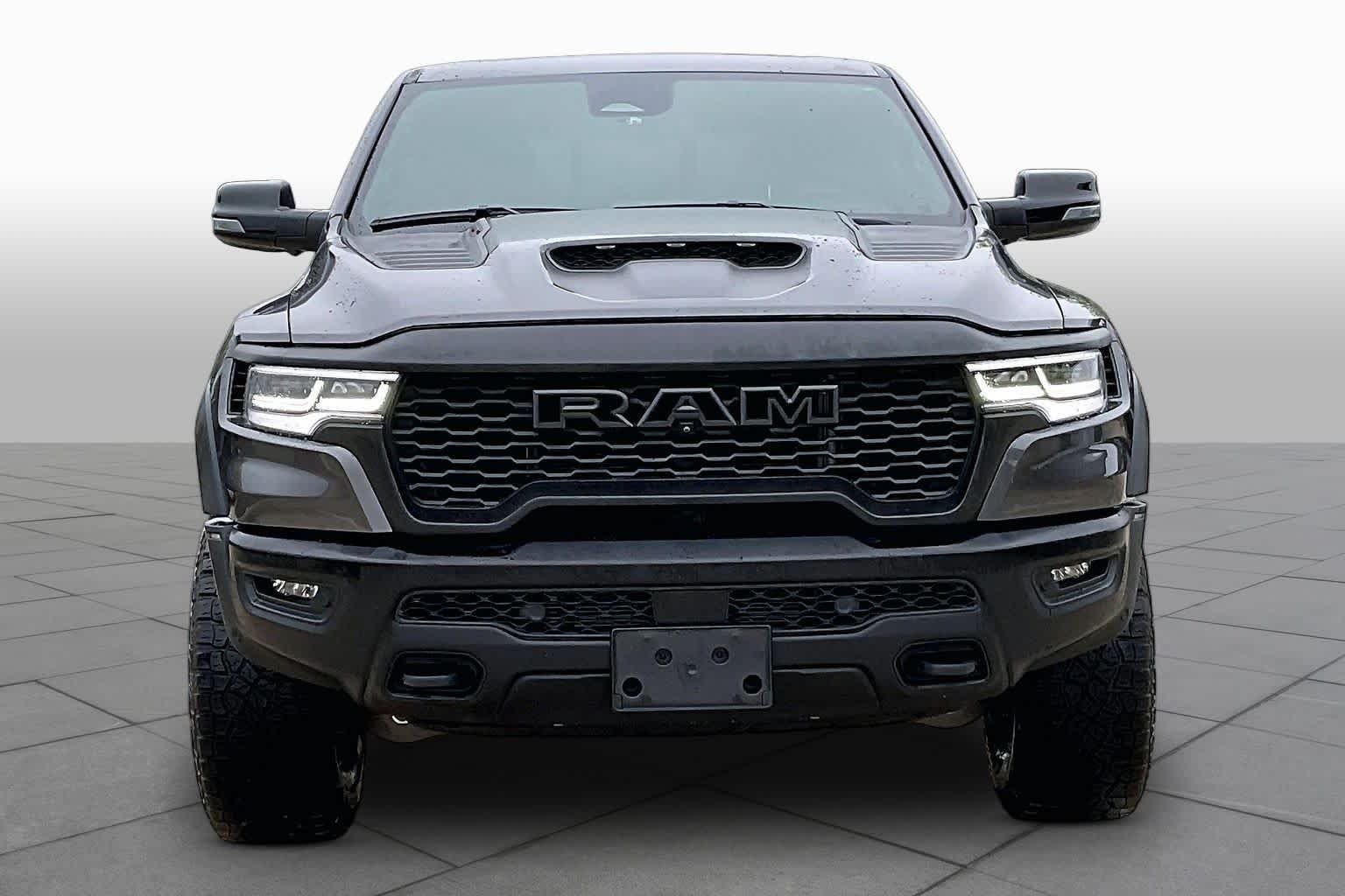 Used 2025 Granite Crystal Metallic Clearcoat Ram RHO image 3