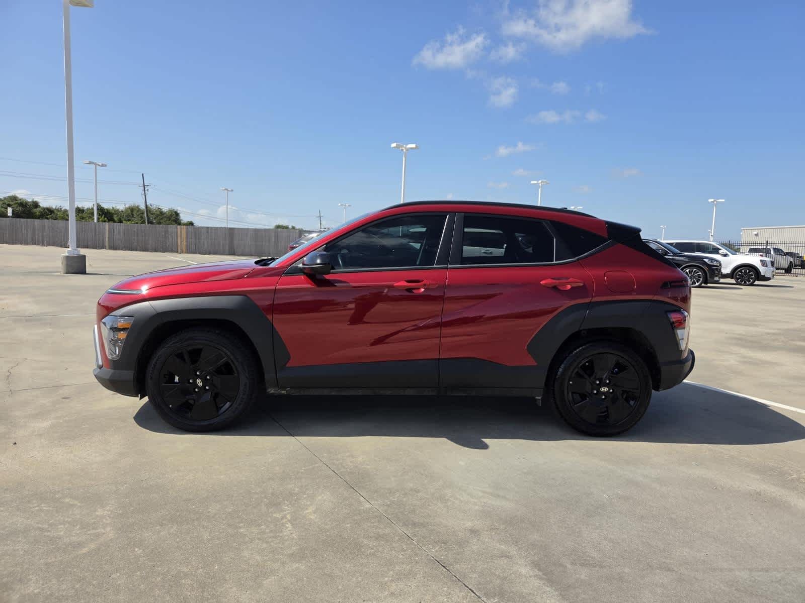 Used 2026 Ultimate Red Metallic Hyundai SEL Sport image 2
