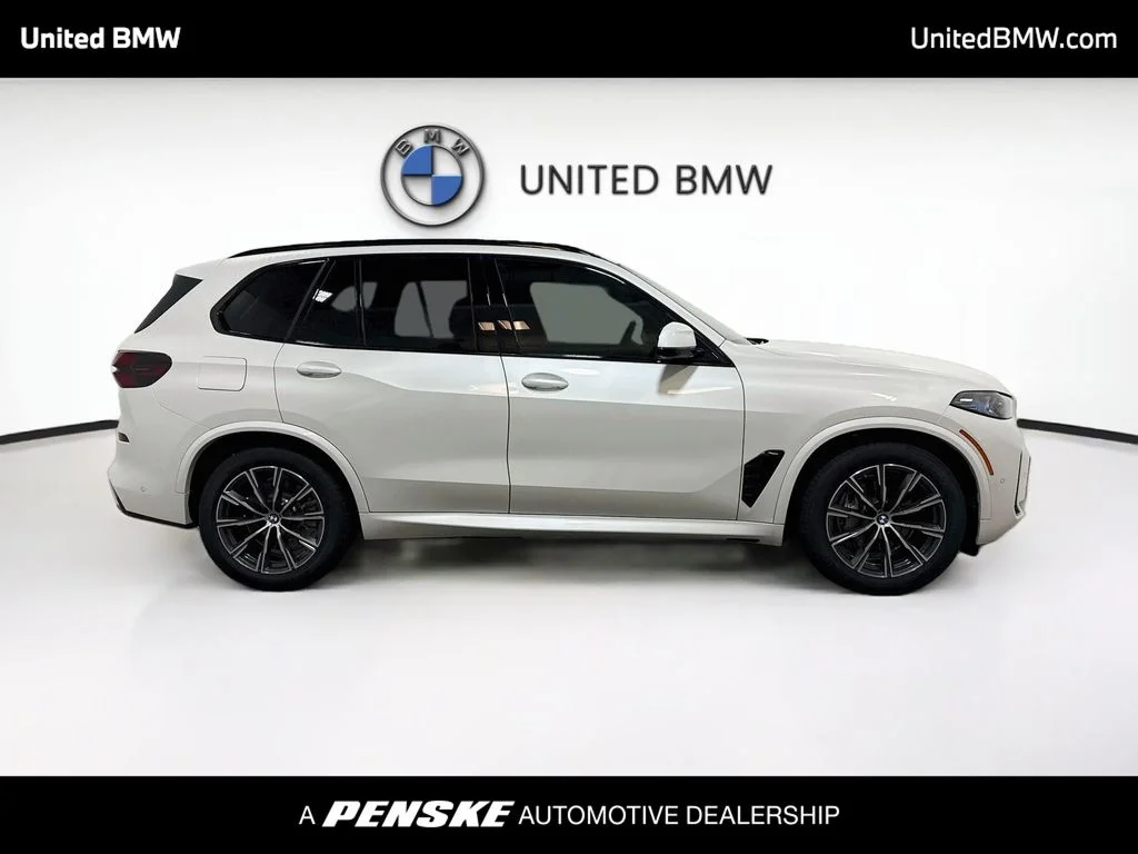 New 2026 Mineral White Metallic BMW xDrive50e image 4