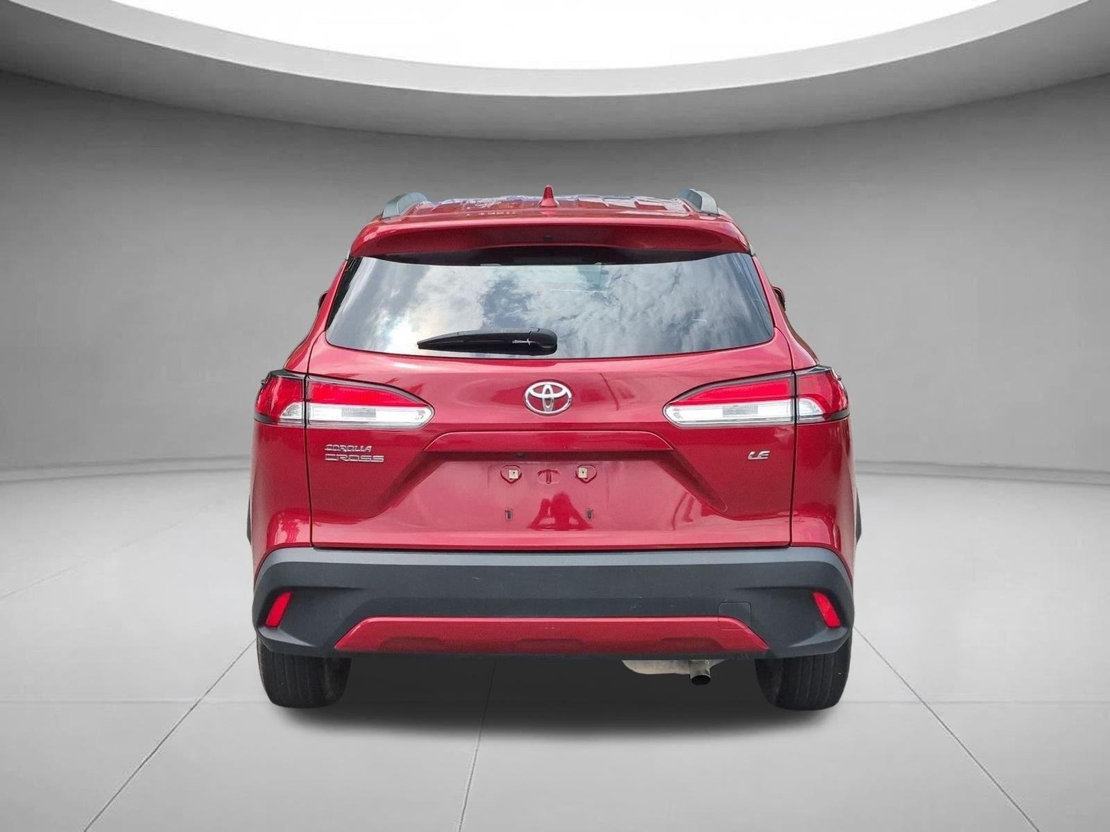 Used 2022 Barcelona Red Metallic Toyota LE image 4