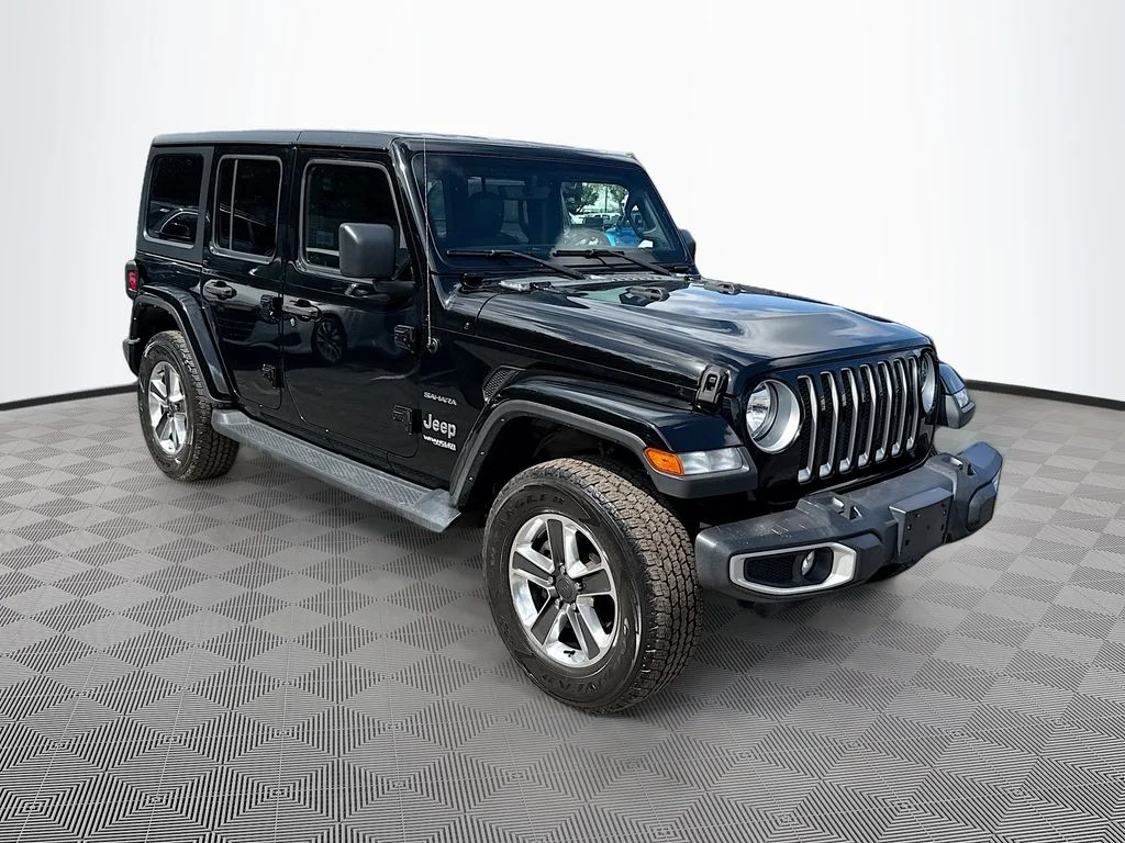 Used 2022 Black Jeep Unlimited Sahara image 4