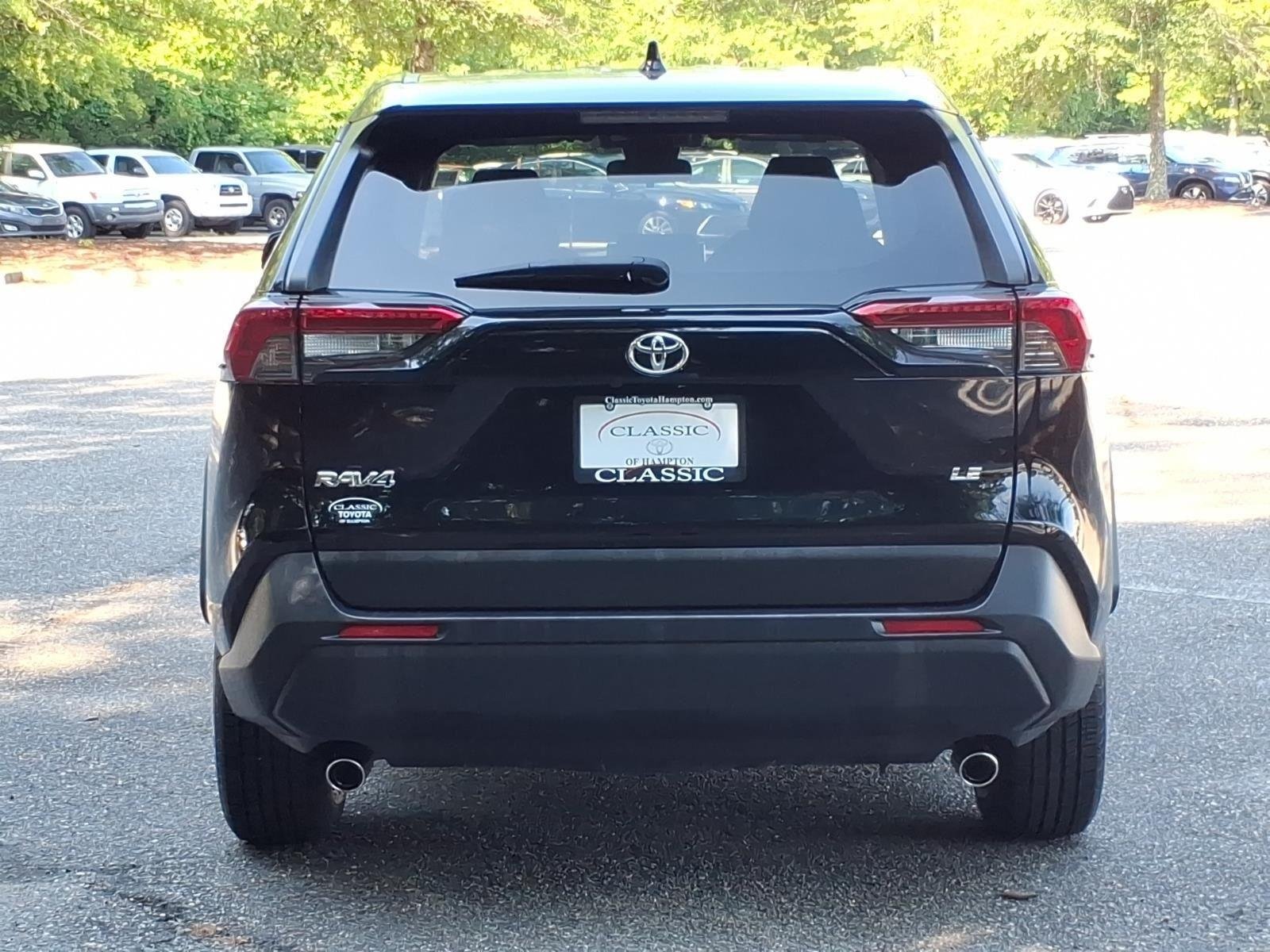 Used 2022 Midnight Black Metallic Toyota LE image 13