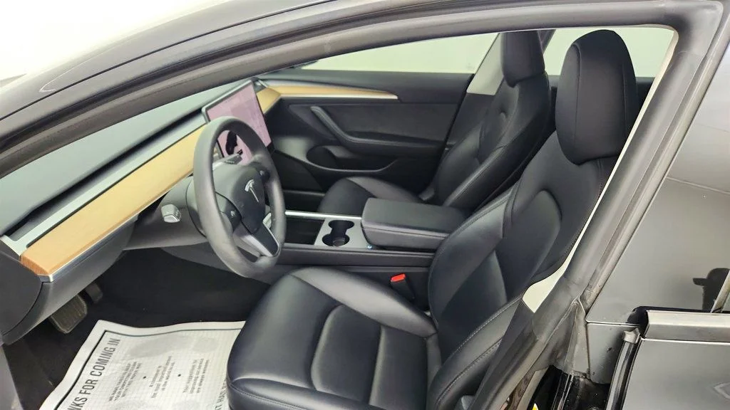 Used 2023 Solid Black Tesla RWD image 24
