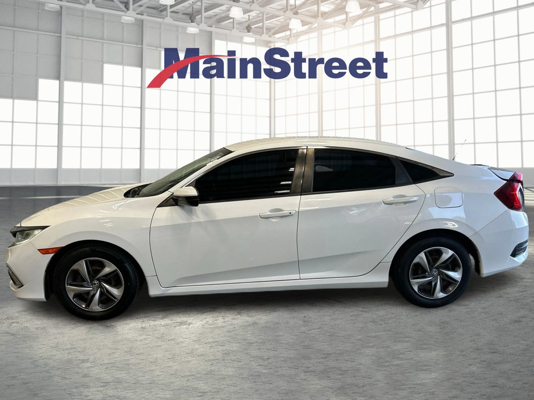 Used 2021 Honda Civic LX with VIN 2HGFC2F6XMH557297 for sale in Kansas City