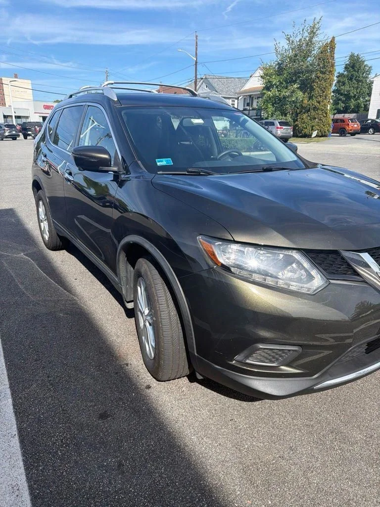 Used 2016 Black Nissan SV image 1