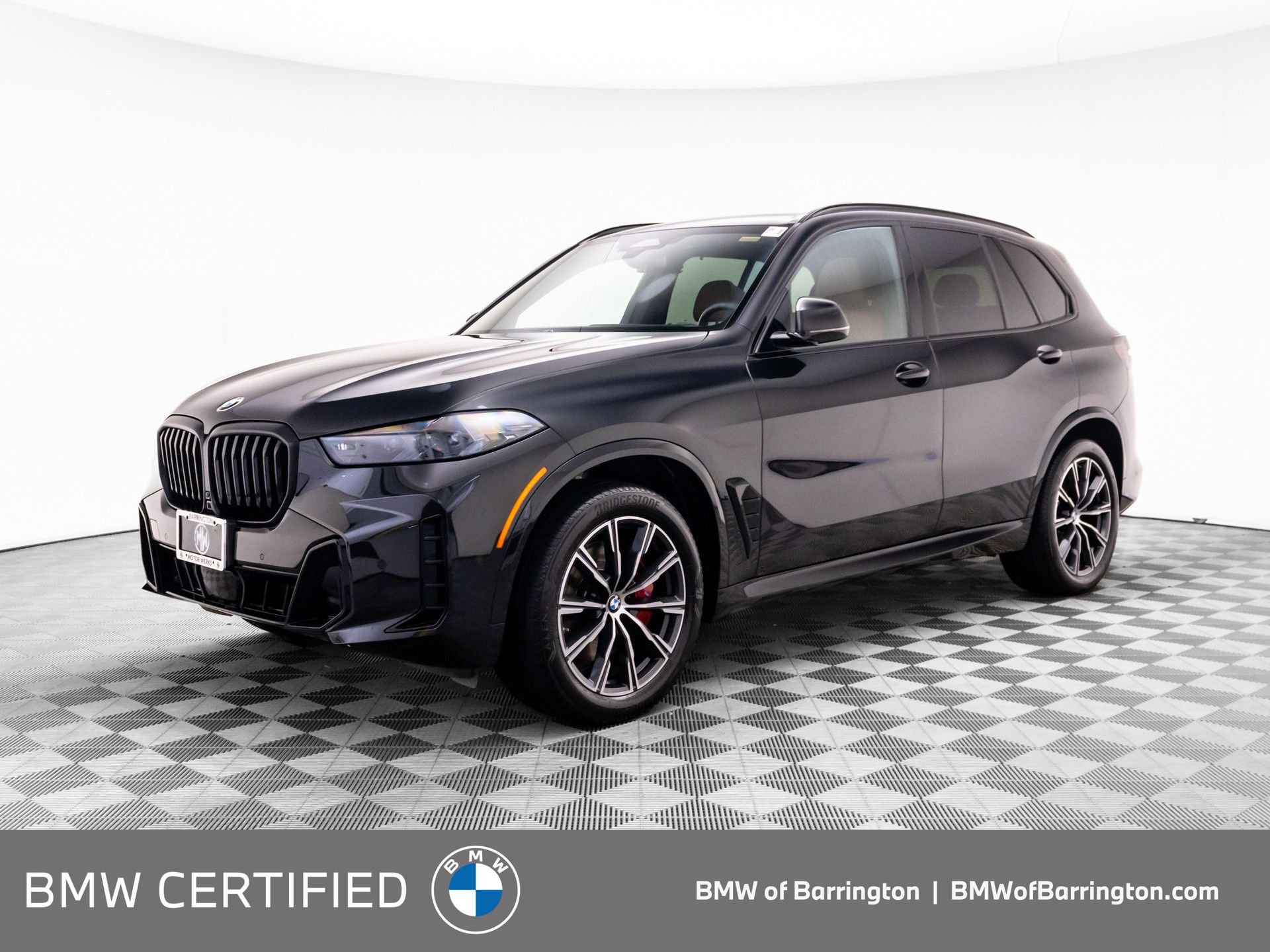 Certified Used 2024 Black Sapphire Metallic BMW xDrive40i image 1