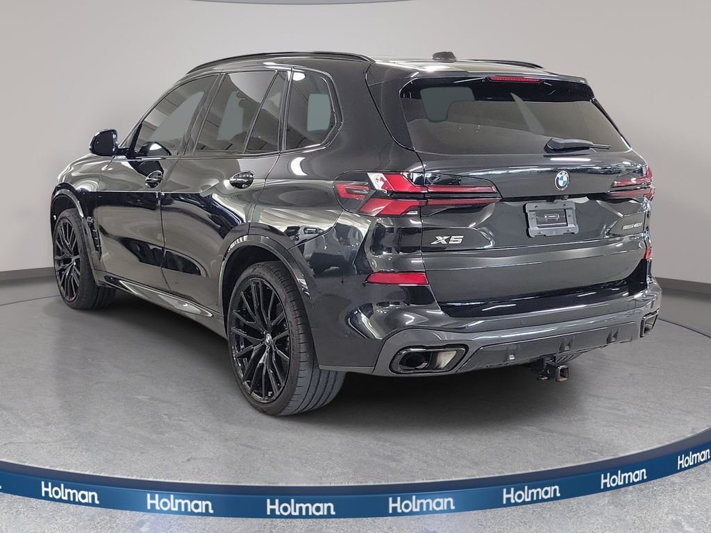 Certified Used 2025 Black Sapphire Metallic BMW sDrive40i image 9