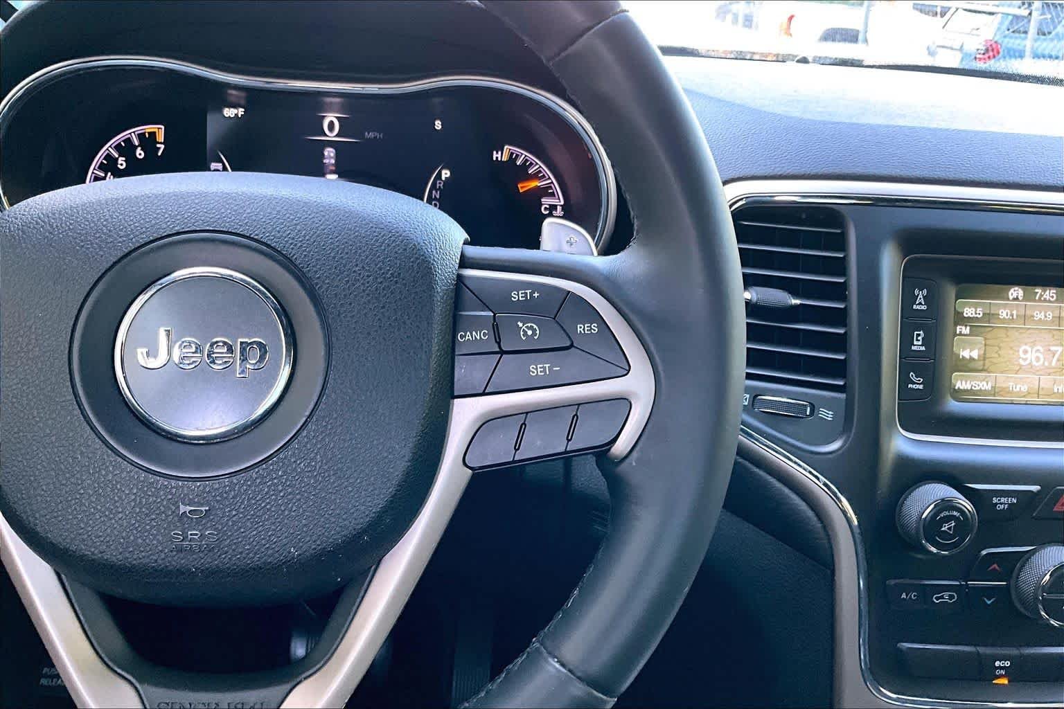 Used 2015 Billet Silver Metallic Clearcoat Jeep Laredo image 24