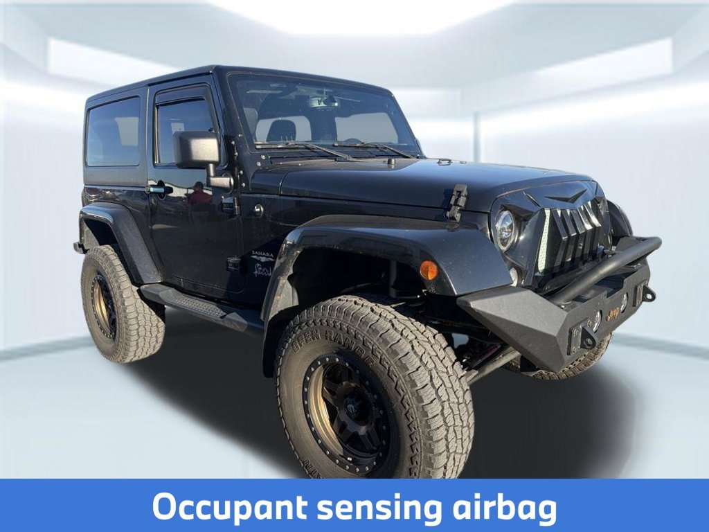 Used 2015 Black Clearcoat Jeep Sahara image 4