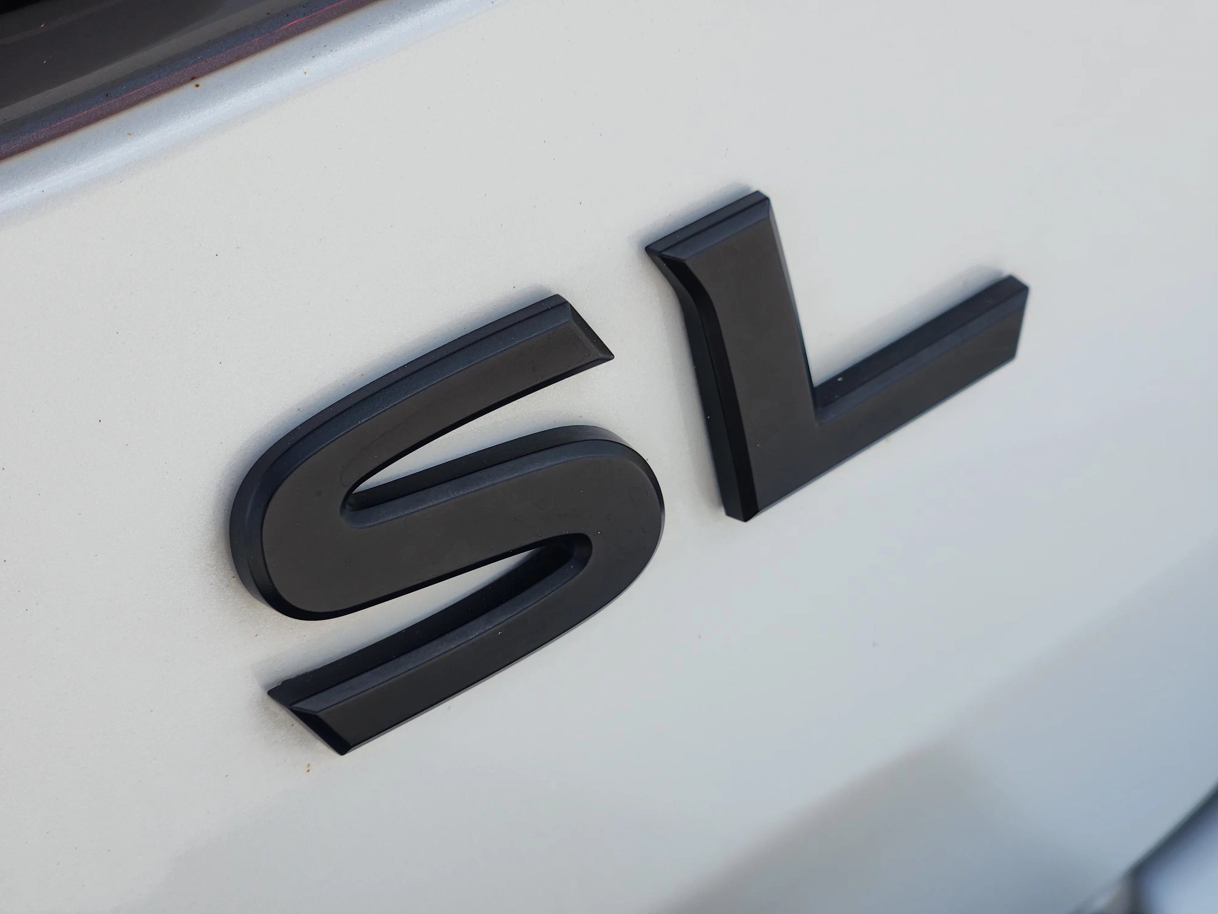 Used 2023 Aspen White Tricoat Nissan SL image 12