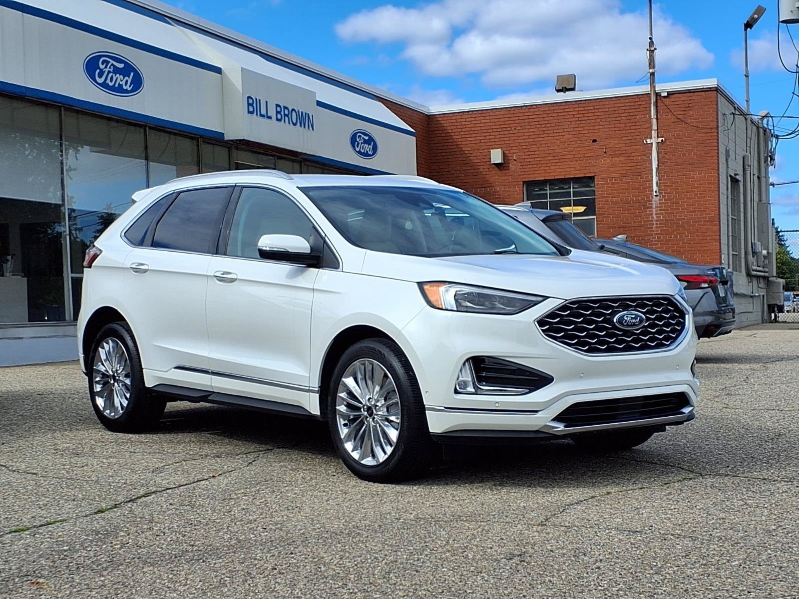 Certified Used 2024 Star White Ford Titanium image 1