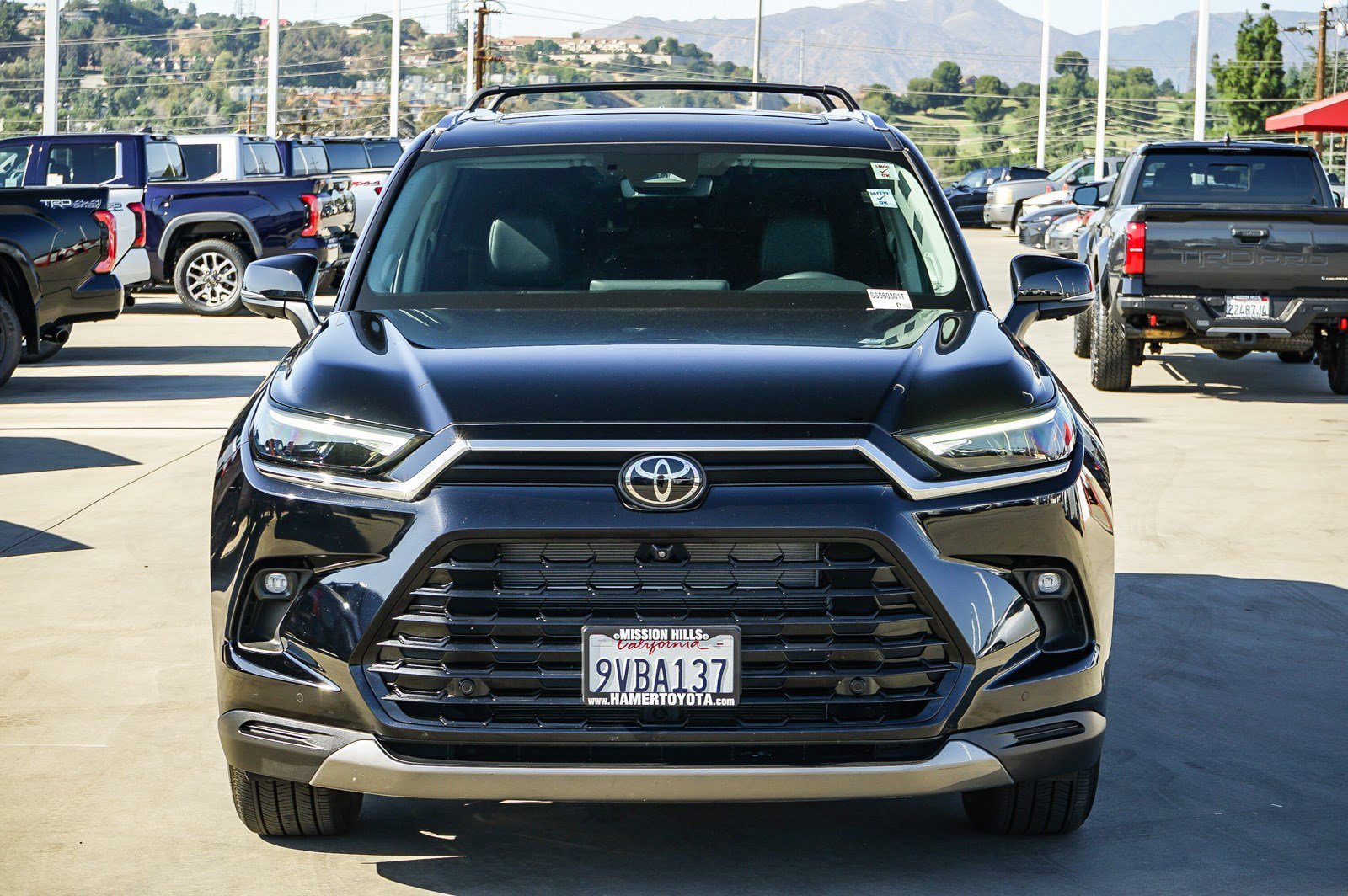 Certified Used 2025 Midnight Black Metallic Toyota Hybrid XLE image 6