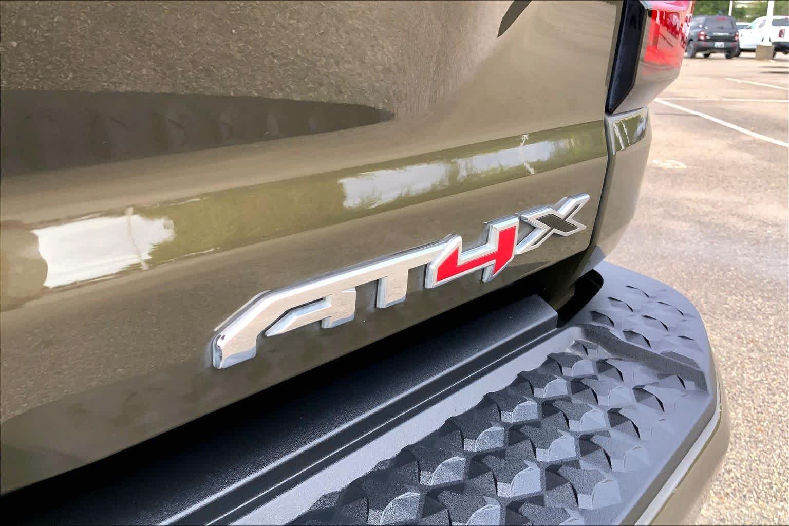Used 2024 Deep Bronze Metallic GMC 4WD AT4X image 10
