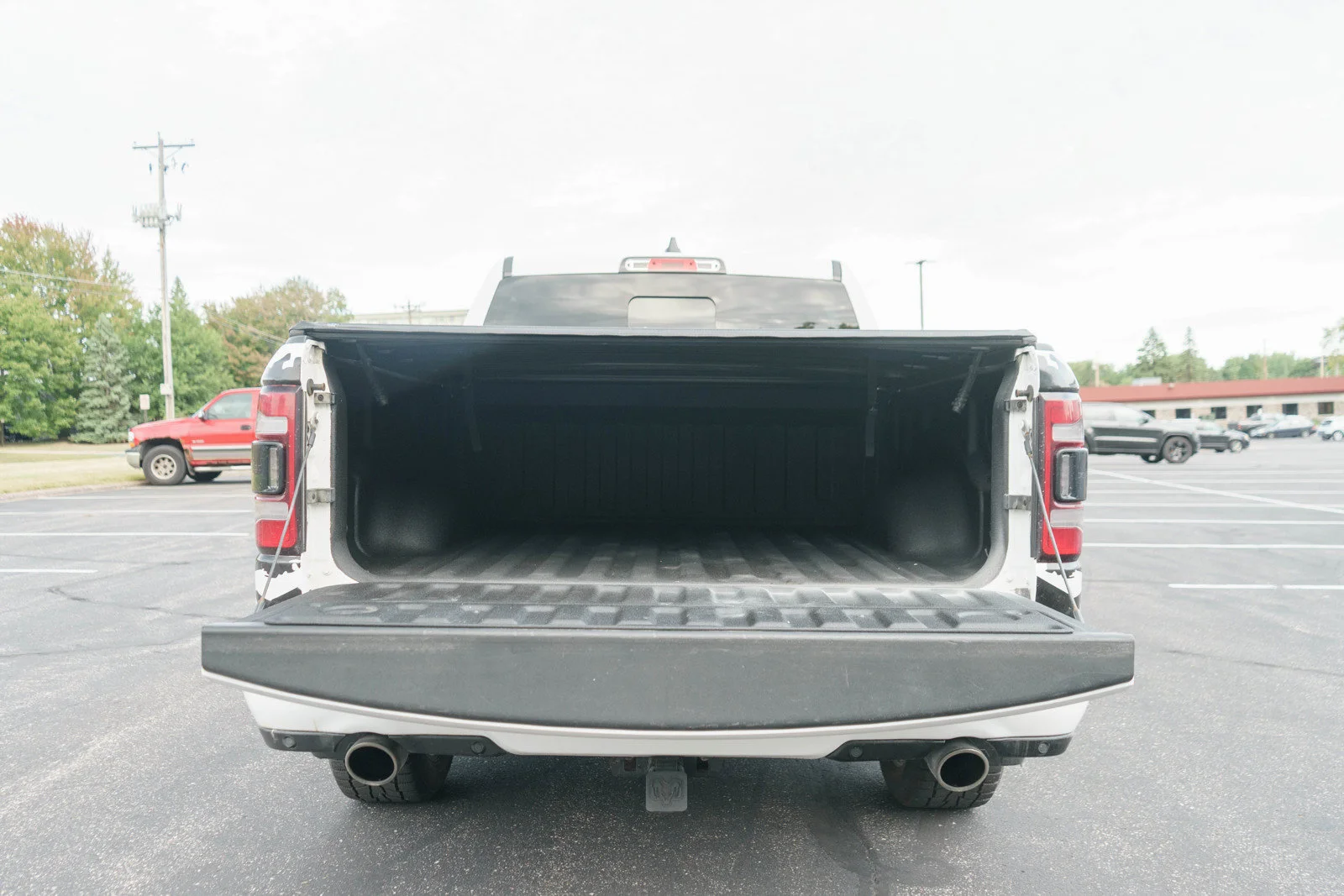 Used 2022 Bright White Clearcoat Ram Sport image 9