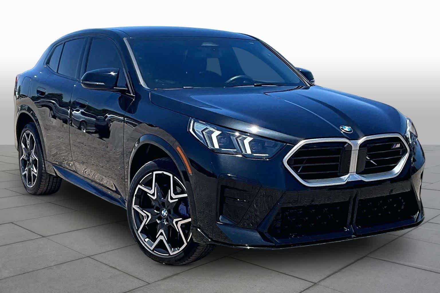 Used 2024 Black Sapphire Metallic BMW M35i image 2