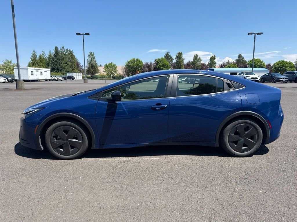 Used 2025 Reservoir Blue Toyota LE image 4