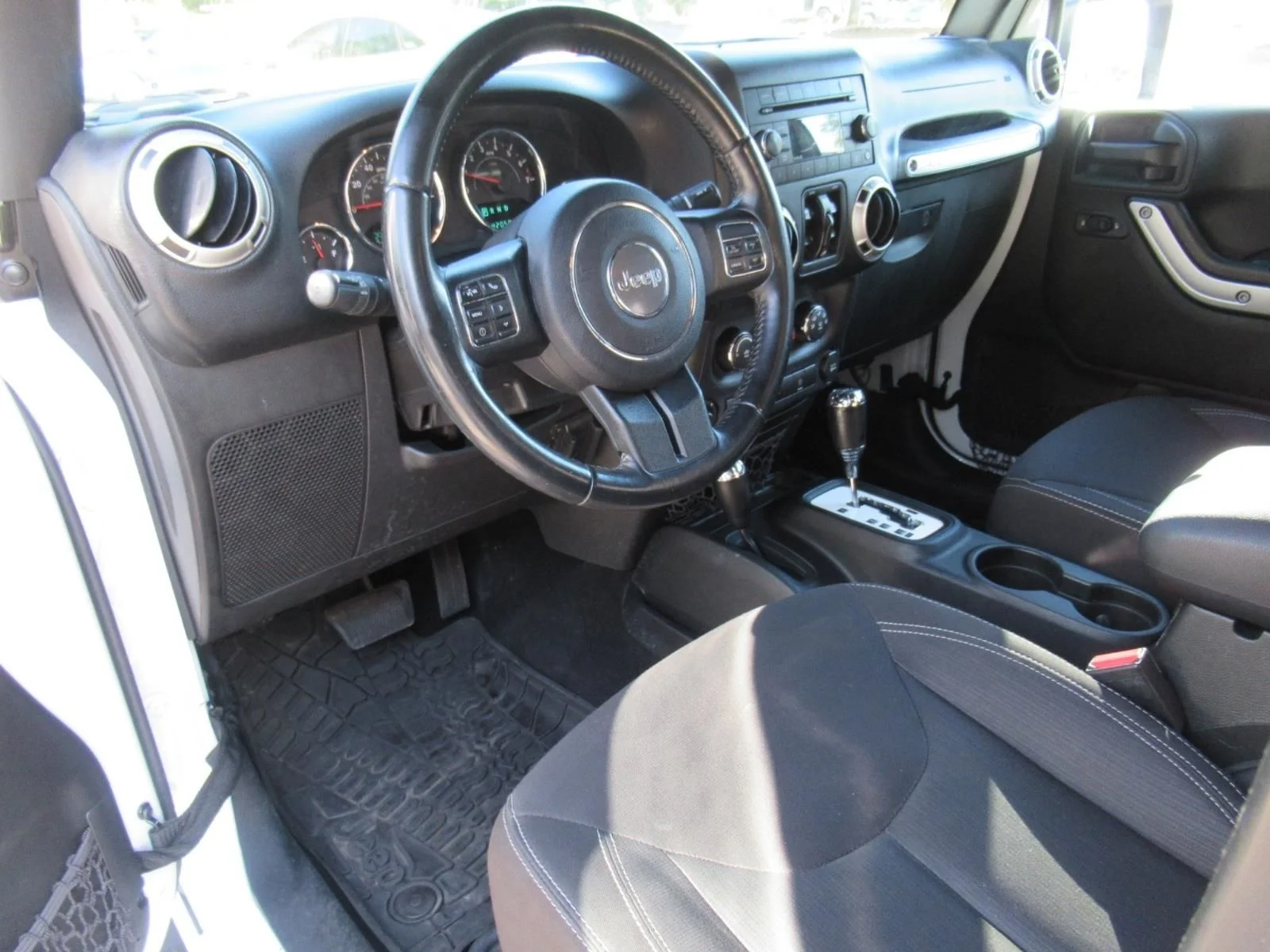 Used 2017 White Jeep Unlimited Sahara image 16