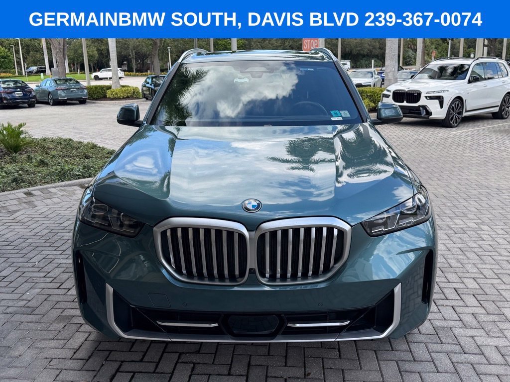 Certified Used 2024 Blue BMW xDrive40i image 1