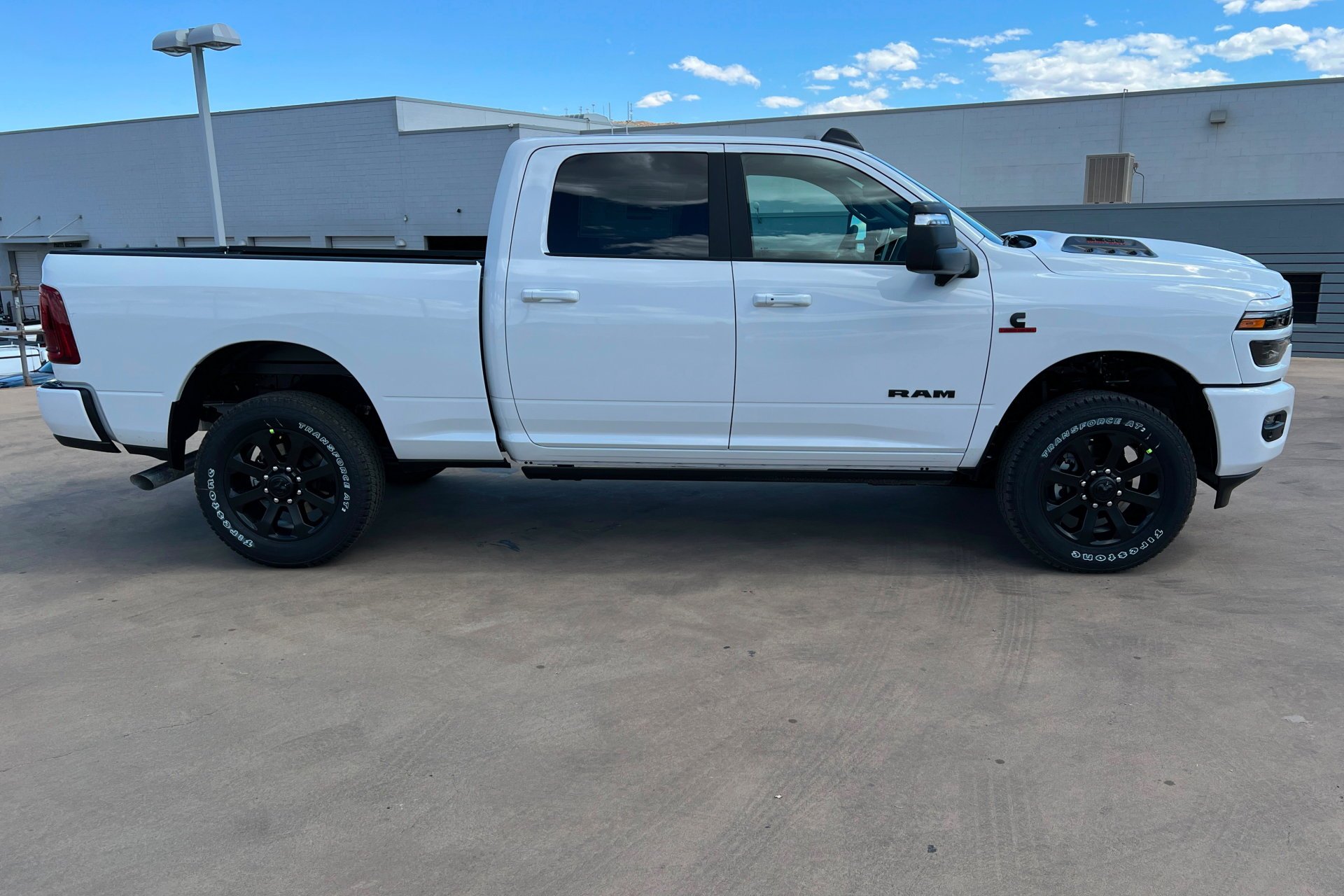 New 2026 Bright White Clear-Coat Exterior Paint RAM Laramie image 7