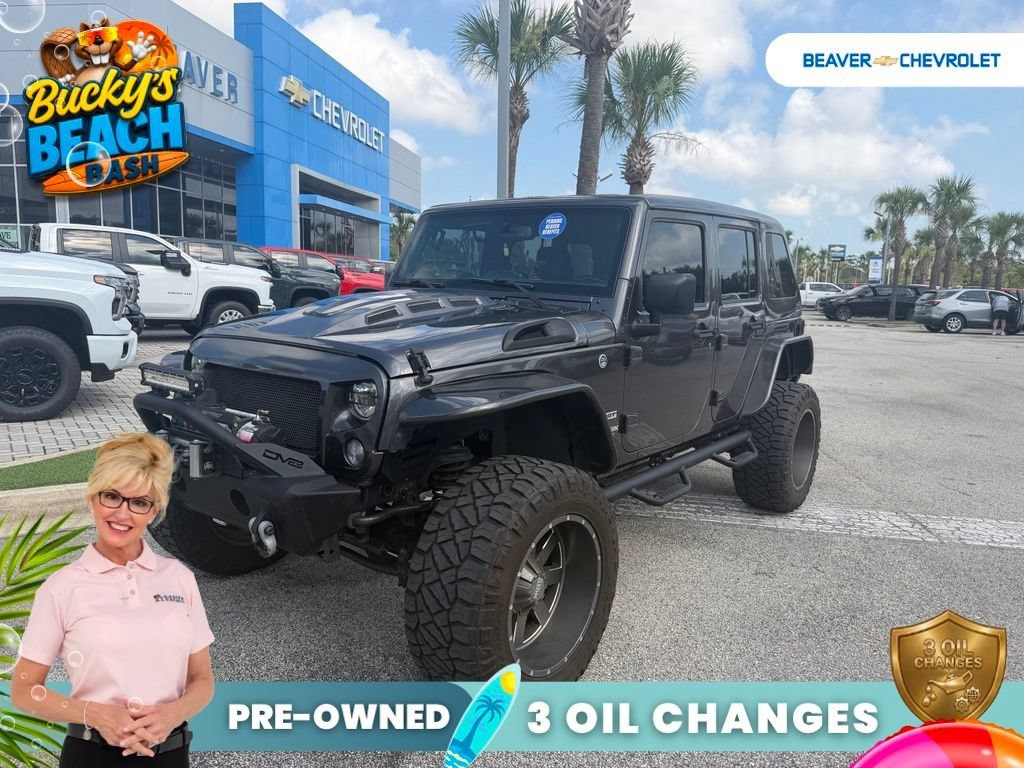 Used 2018 Gray Jeep Sport S image 1