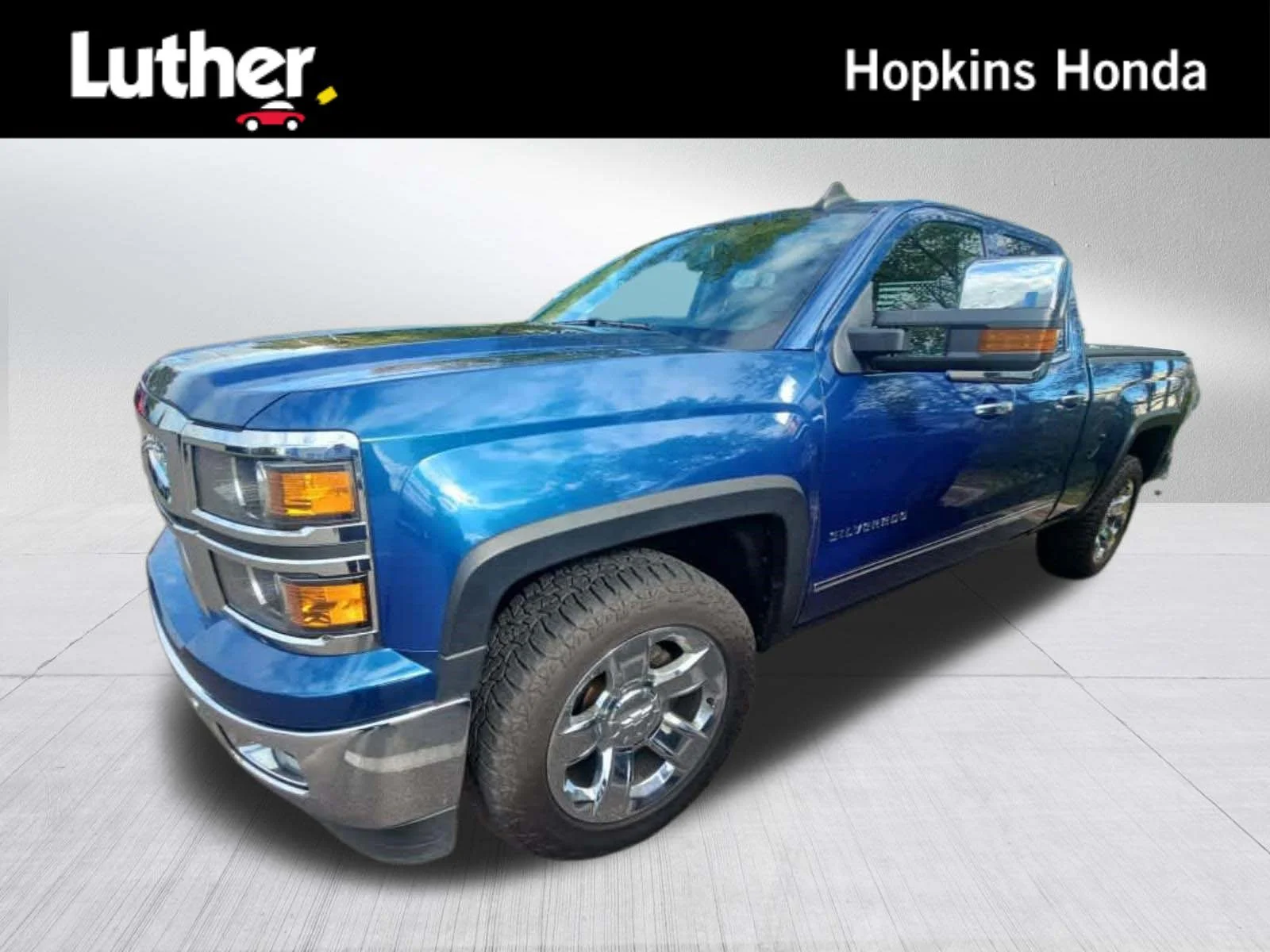 Used 2015 Deep Ocean Blue Metallic Chevrolet LTZ image 1
