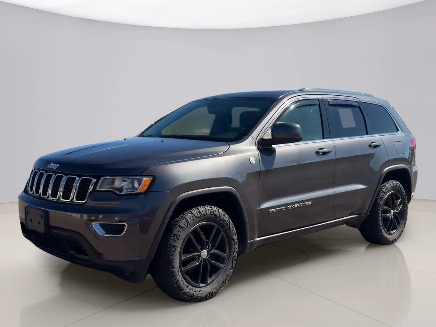 Used 2017 Gray Jeep LAREDO image 1
