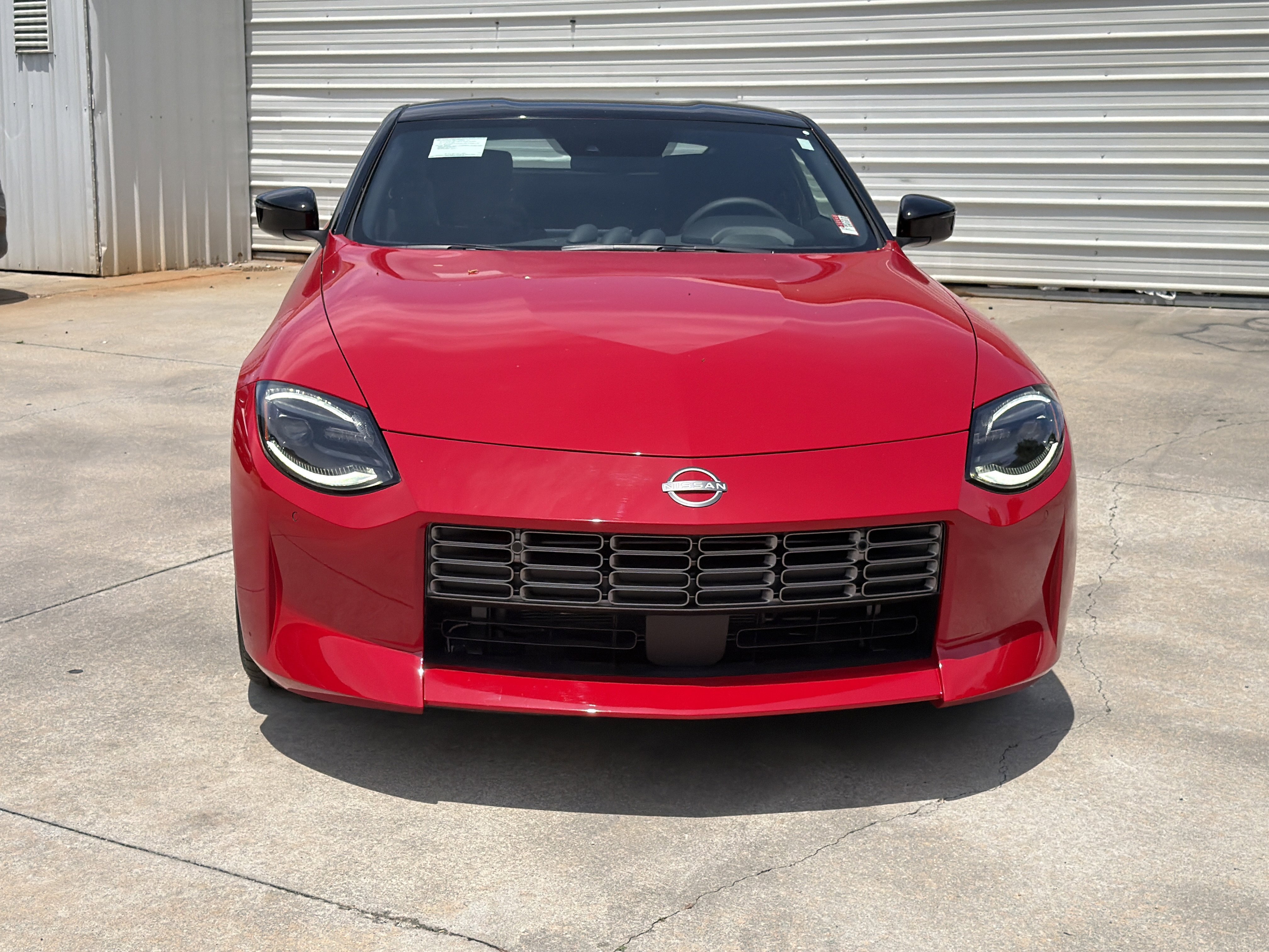 New 2026 Solid Red/Super Black Nissan Sport image 3