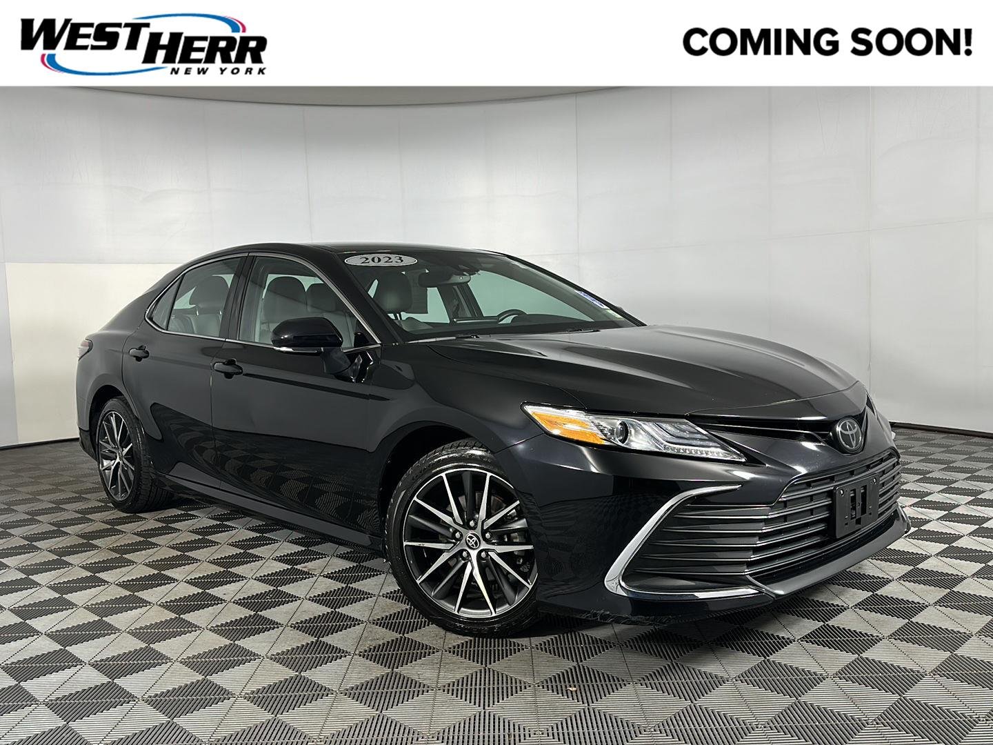 Used 2023 Midnight Black Metallic Toyota XLE image 1