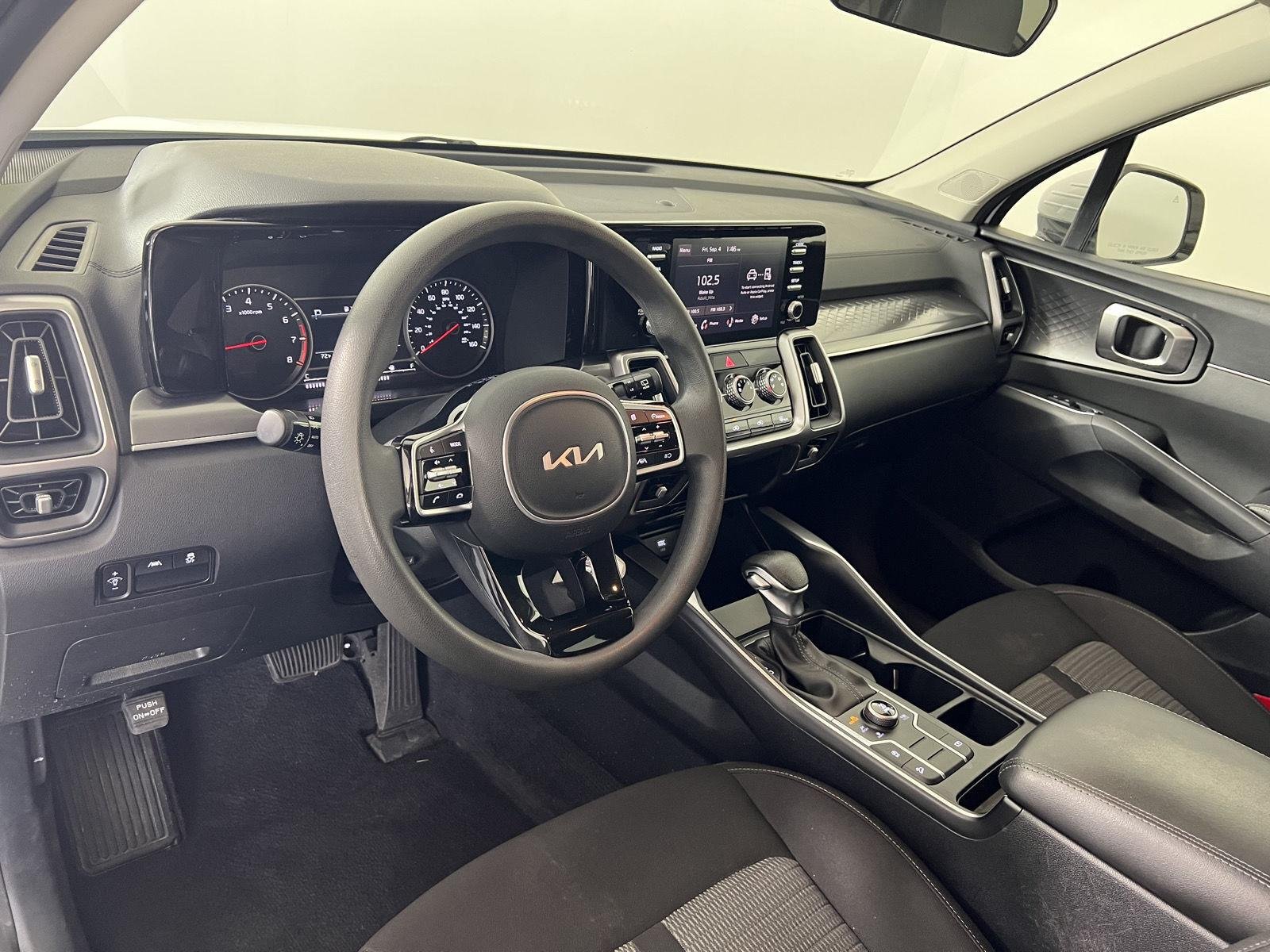 Used 2023 Glacial White Pearl Kia LX image 6