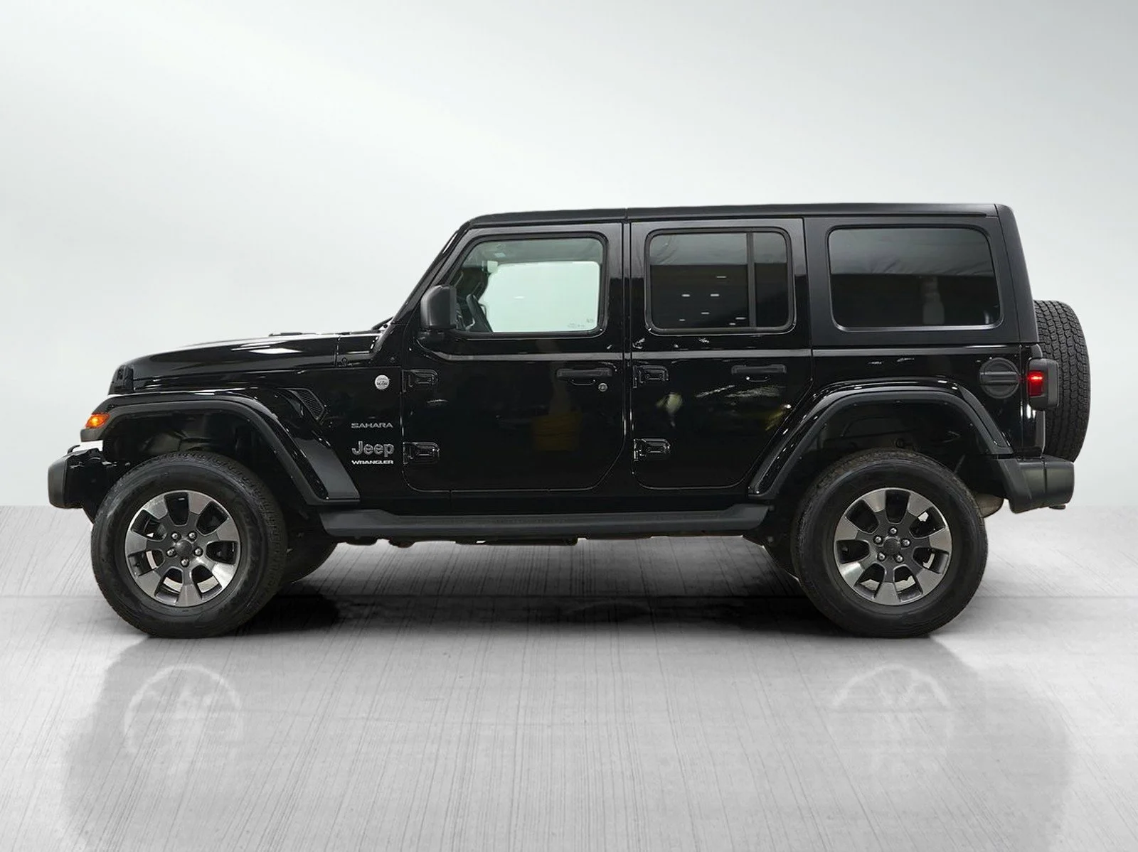 Used 2023 Jeep Wrangler 4-Door Sahara with VIN 1C4HJXEN8PW519849 for sale in Wayzata, Minnesota