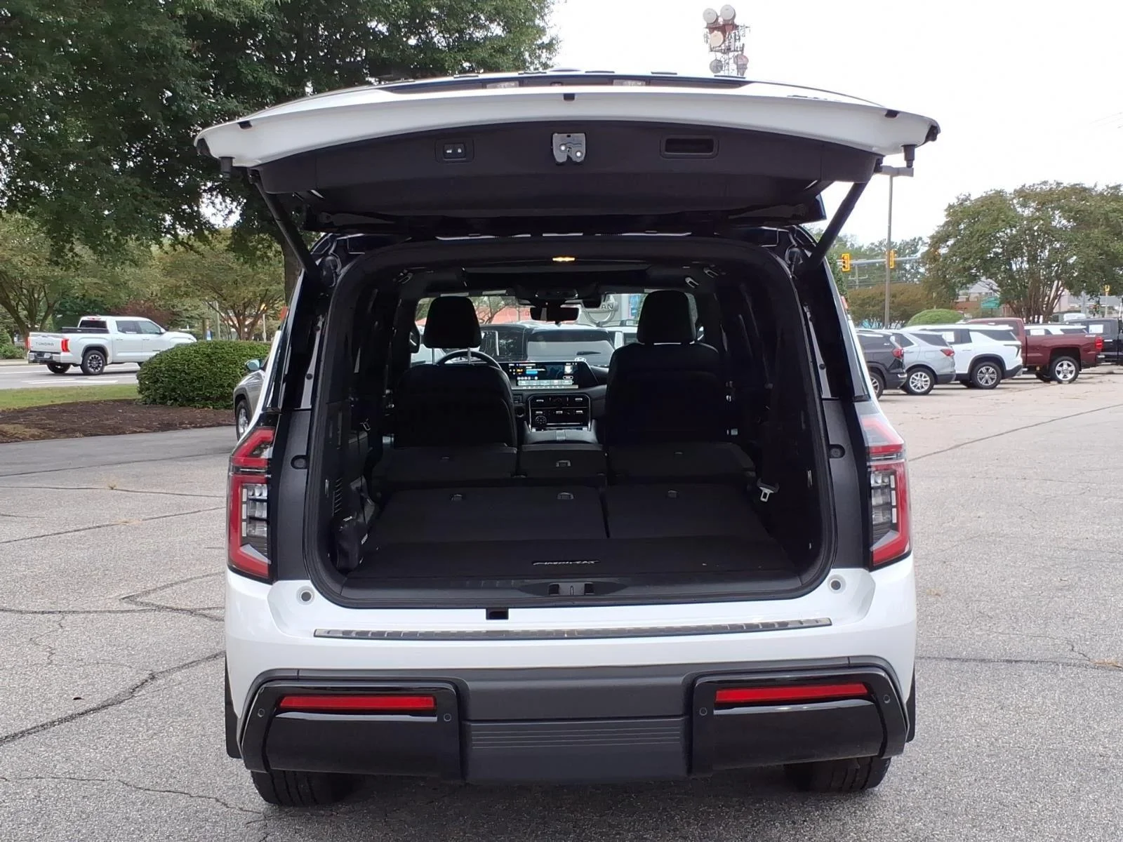 Used 2025 Aspen White Tricoat/Super Black Nissan PRO-4X image 24