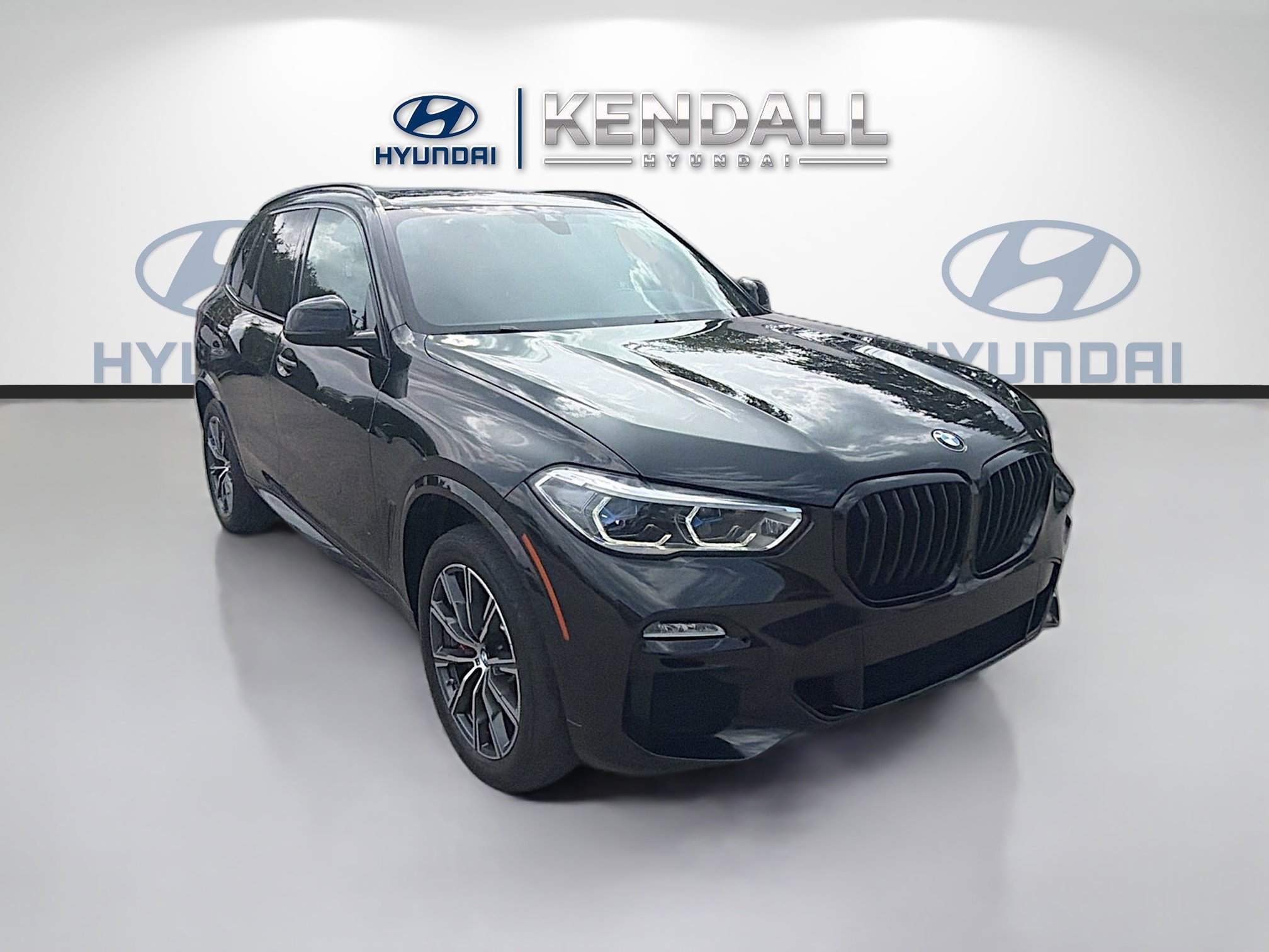 Used 2021 Black Sapphire Metallic BMW M50i image 1