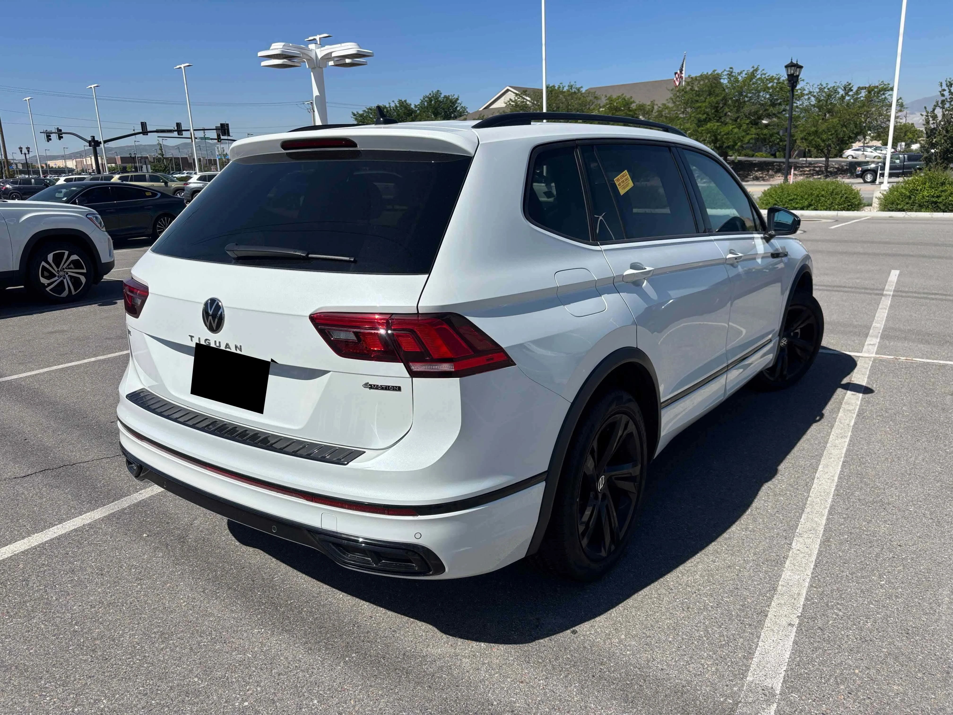Used 2024 Opal White Volkswagen SE R-Line Black image 4